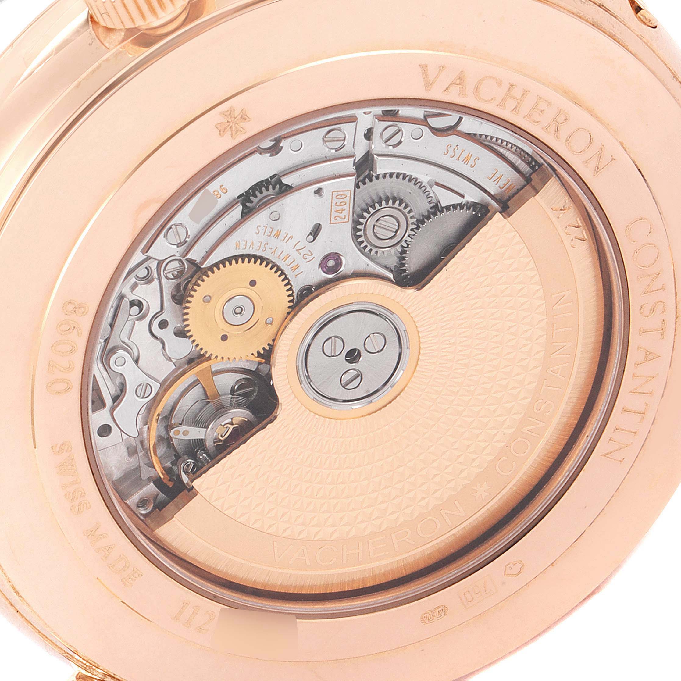 The image shows the back of the Vacheron Constantin Patrimony 86020/000R-9239 Men's Rose Gold Silver Dial 86020/000R-9239 Men's Rose Gold Silver Dial watch, highlighting the movement and intricate mechanical parts.