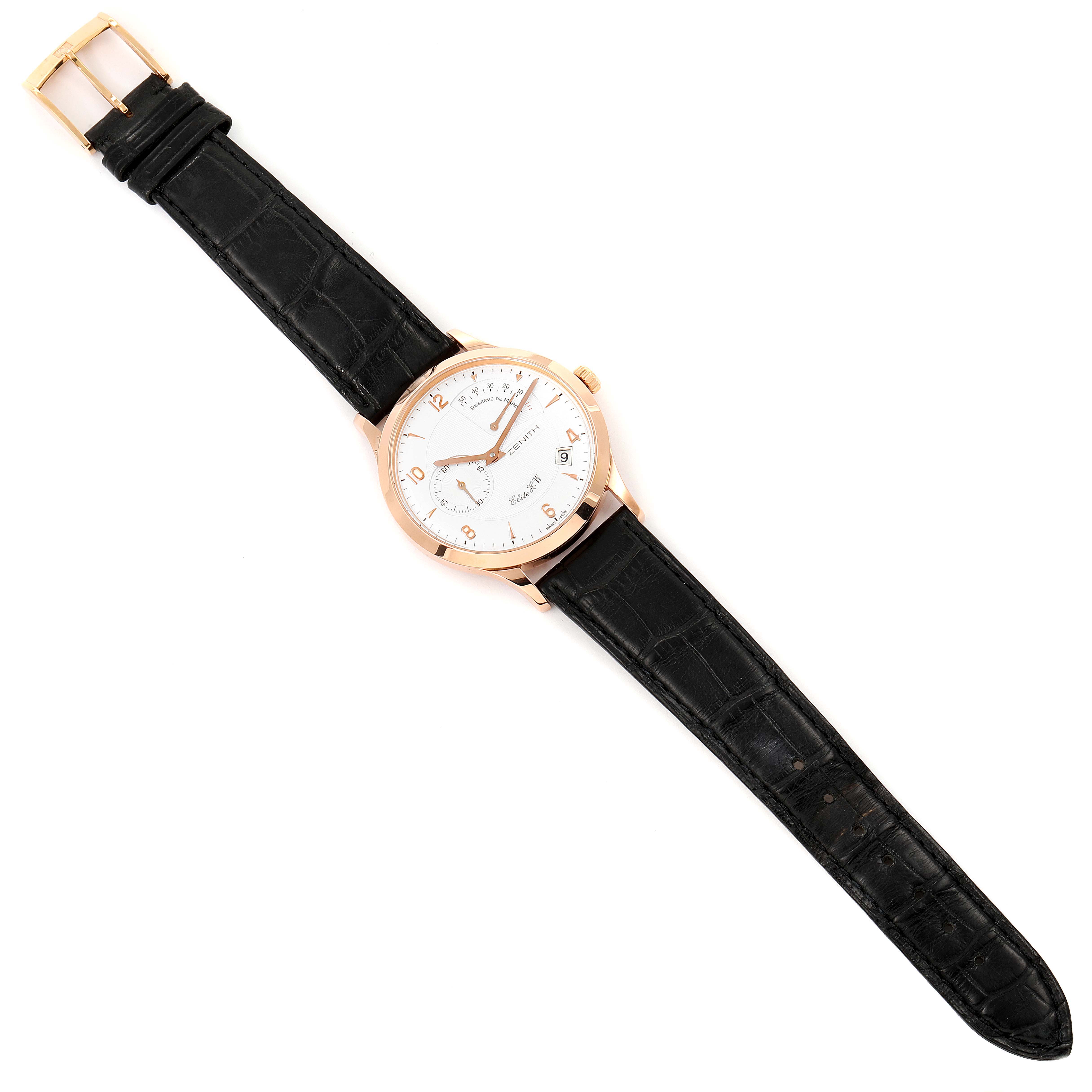 The image shows a Zenith 17.1125.655/01 Men's Rose Gold Silver Dial 17.1125.655/01 Men's Rose Gold Silver Dial Reserve De Marche Elite HW 18k Rose Gold Mens Watch 11.1125.655 viewed from a top-down angle, displaying the watch face and strap.