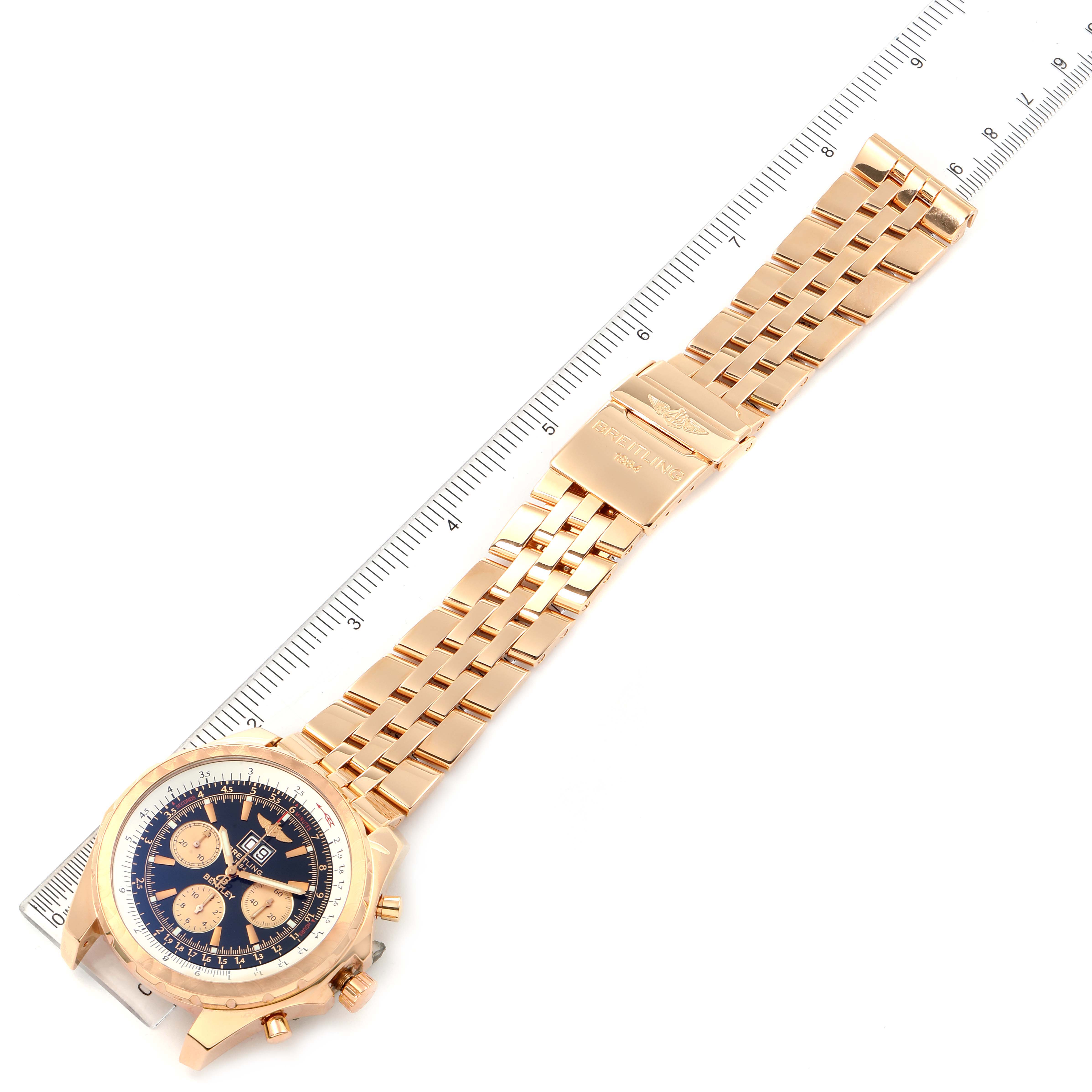 The Breitling Bentley H44363 Men's Rose Gold Black Dial H44363 Men's Rose Gold Black Dial watch is shown from a top-down angle, displaying its face, bezel, and full metal bracelet.