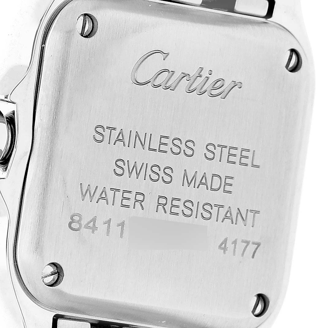 The image shows the back case of a Cartier Panthère watch, displaying engravings including brand details and material.