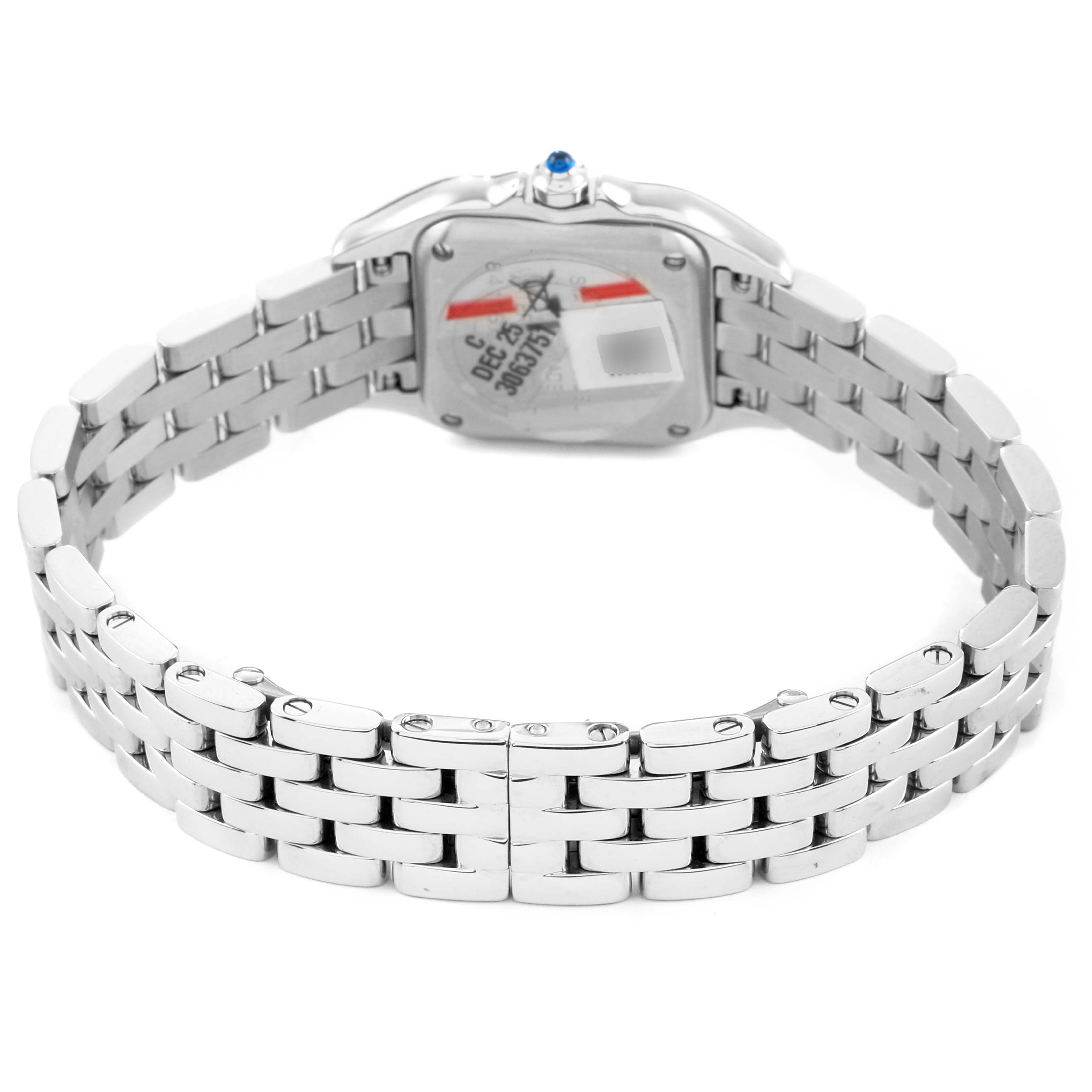 The Cartier Panthère watch is shown from the back, highlighting its metal bracelet and case back with a visible blue cabochon.