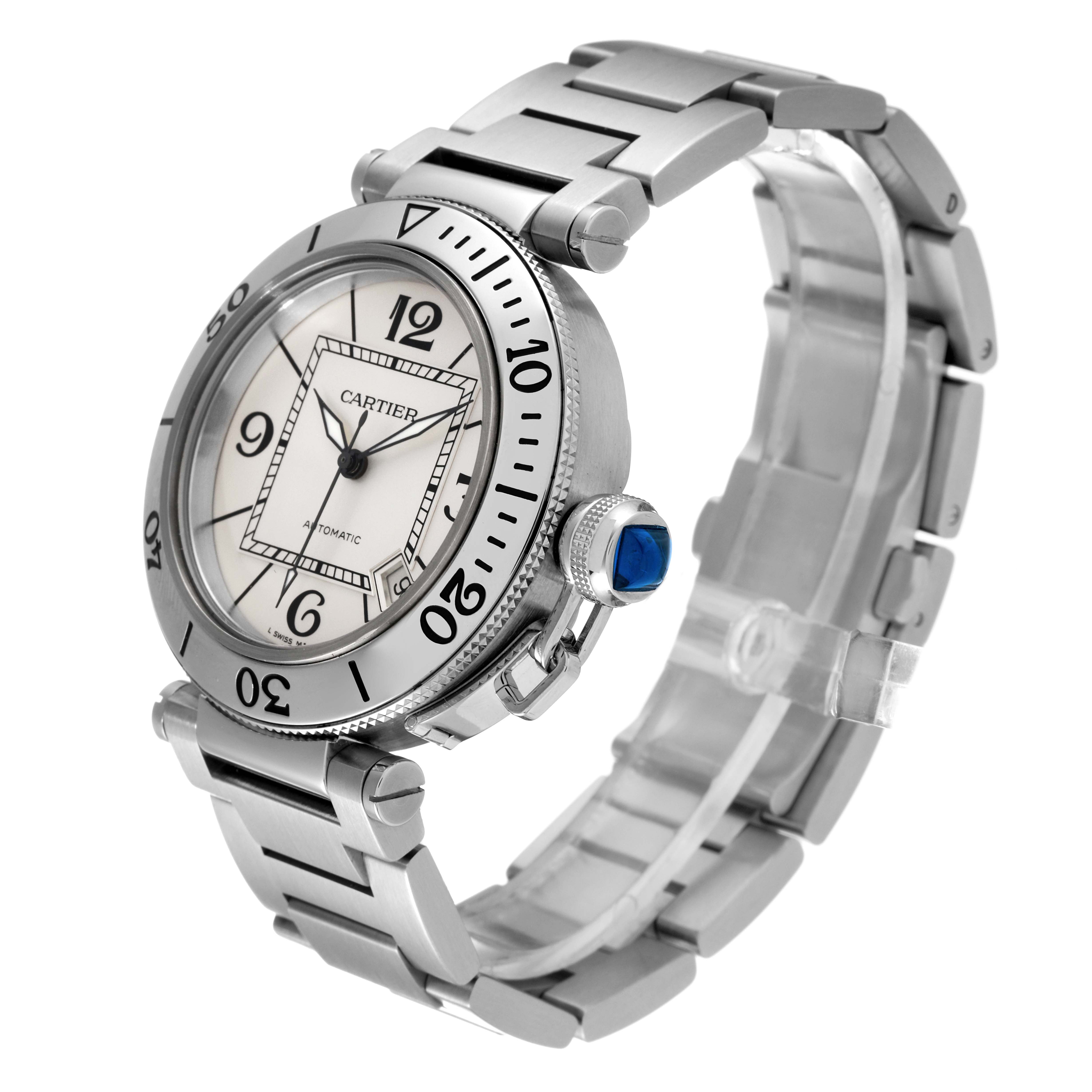 The Cartier Pasha W31080M7 Men
s Stainless Steel Silver Dial W31080M7 Men
s Stainless Steel Silver Dial watch is shown from an angled side view, highlighting the face, bezel, crown with blue accent, and metal bracelet.