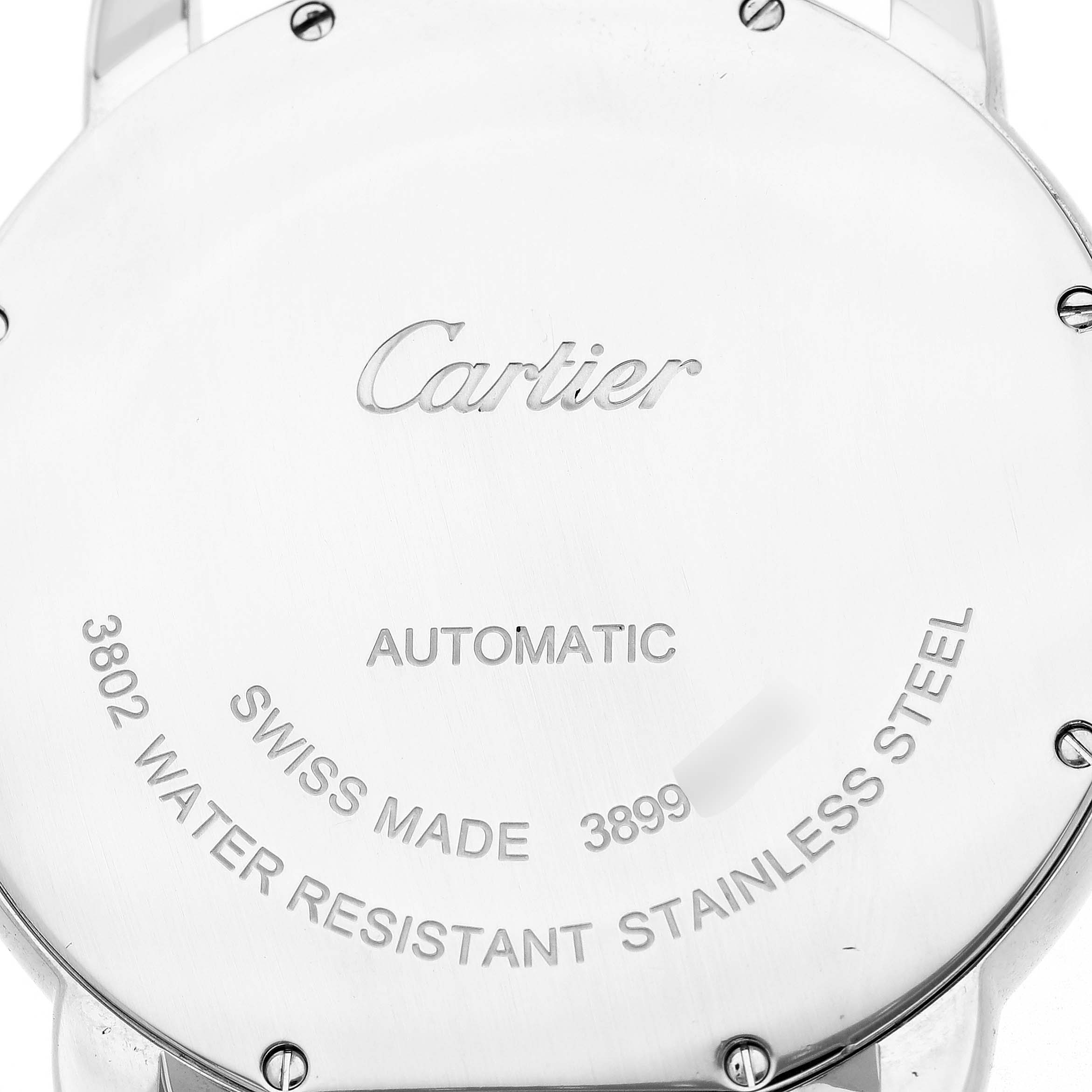 The image shows the back case of a Cartier Ronde WSRN0023 Men's Stainless Steel Blue Dial watch, highlighting engravings such as "Cartier," "Automatic," and "Swiss Made."