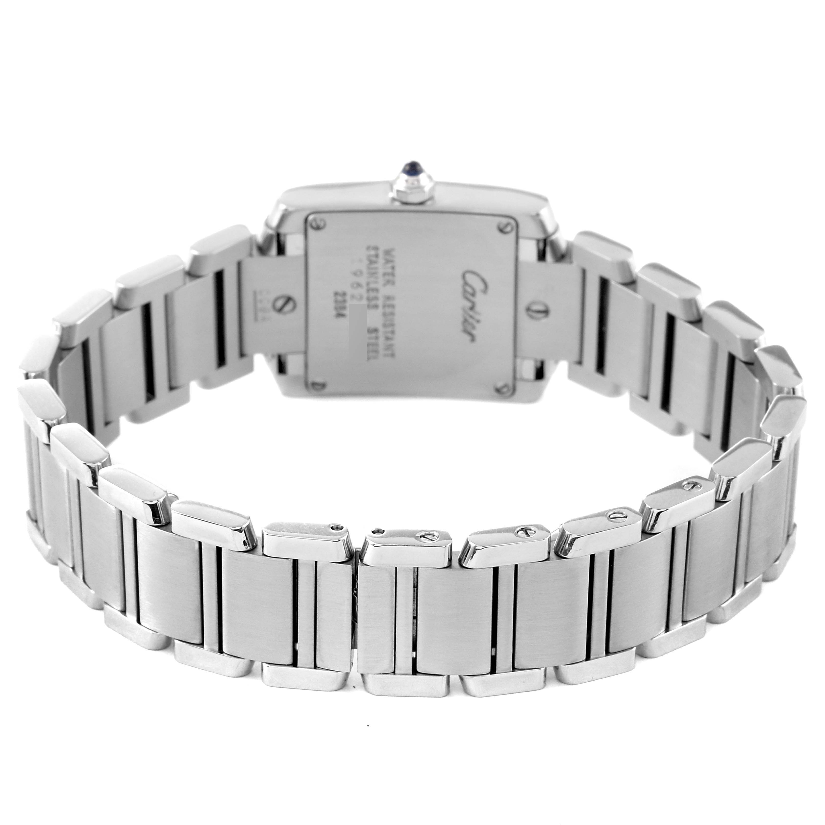 The image shows the back of the Cartier Tank Francaise W51008Q3 Women's Stainless Steel Silver Dial W51008Q3 Women's Stainless Steel Silver Dial watch, highlighting its stainless steel bracelet and case back.