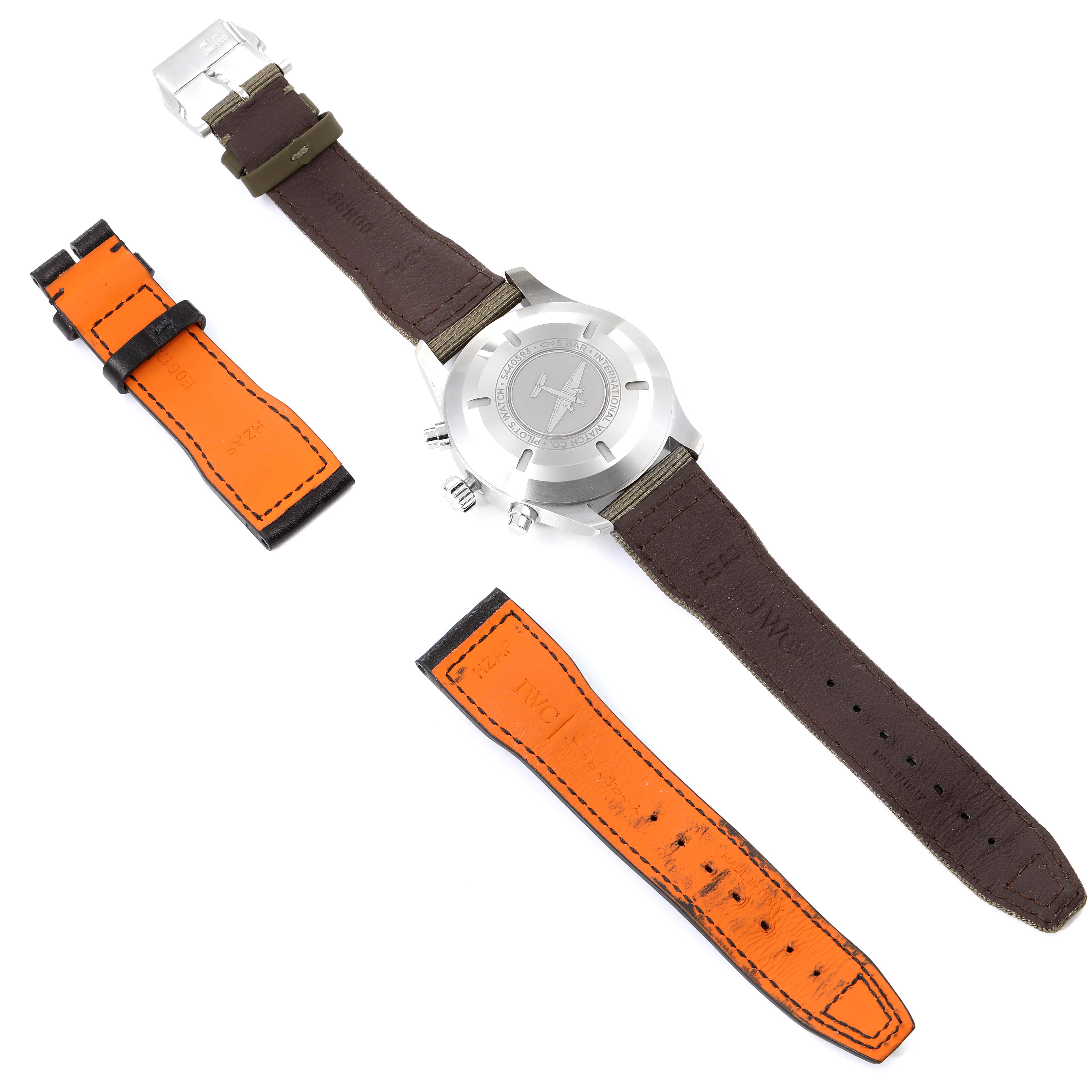 The image shows the back of the IWC Pilot IW377709 Men's Stainless Steel Black Dial IW377709 Men's Stainless Steel Black Dial watch along with three brown and orange detachable straps.