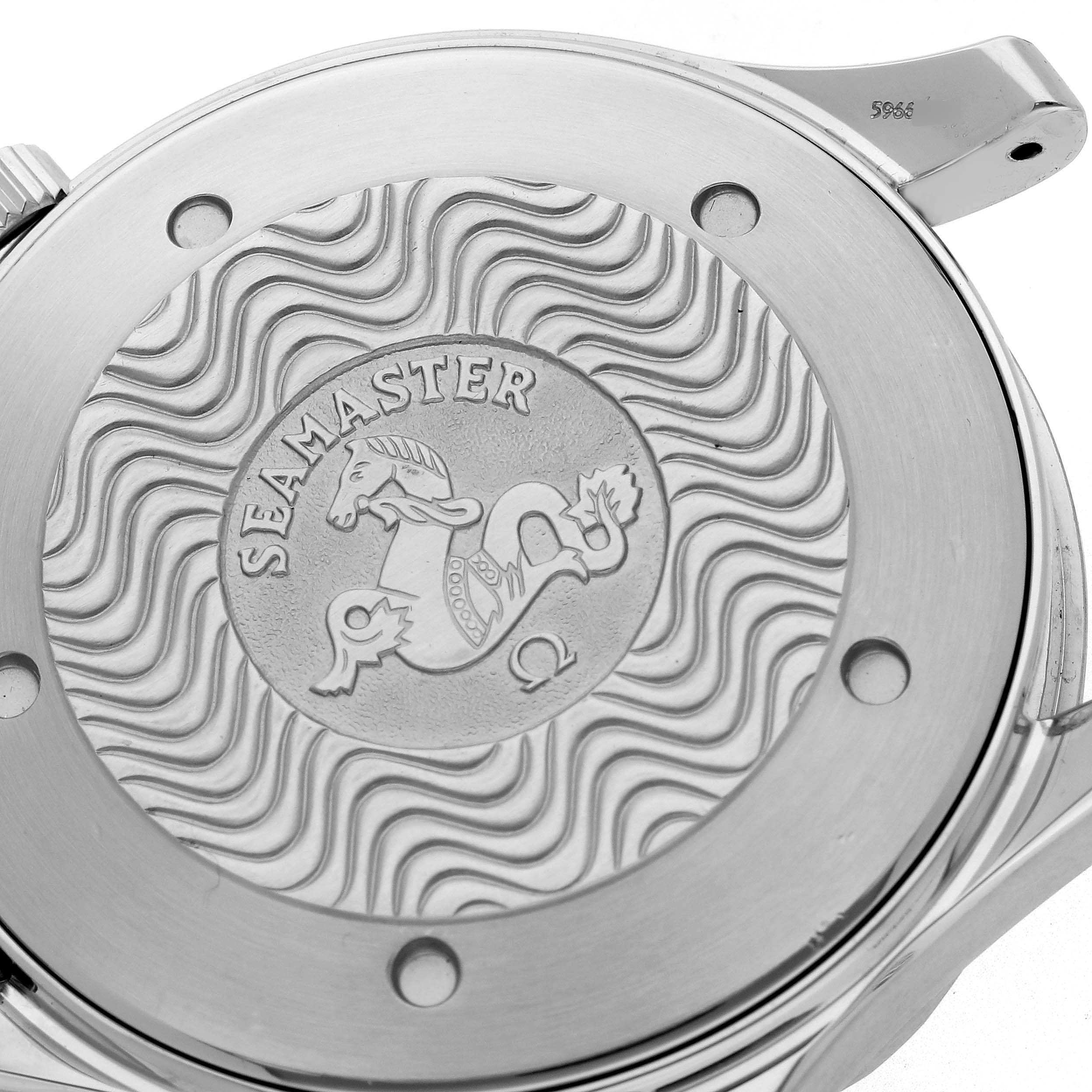 The image shows the back case of an Omega Seamaster 2264.50.00 Men
s Stainless Steel Black Dial 2264.50.00 Men
s Stainless Steel Black Dial watch, featuring an engraved emblem and wave pattern.