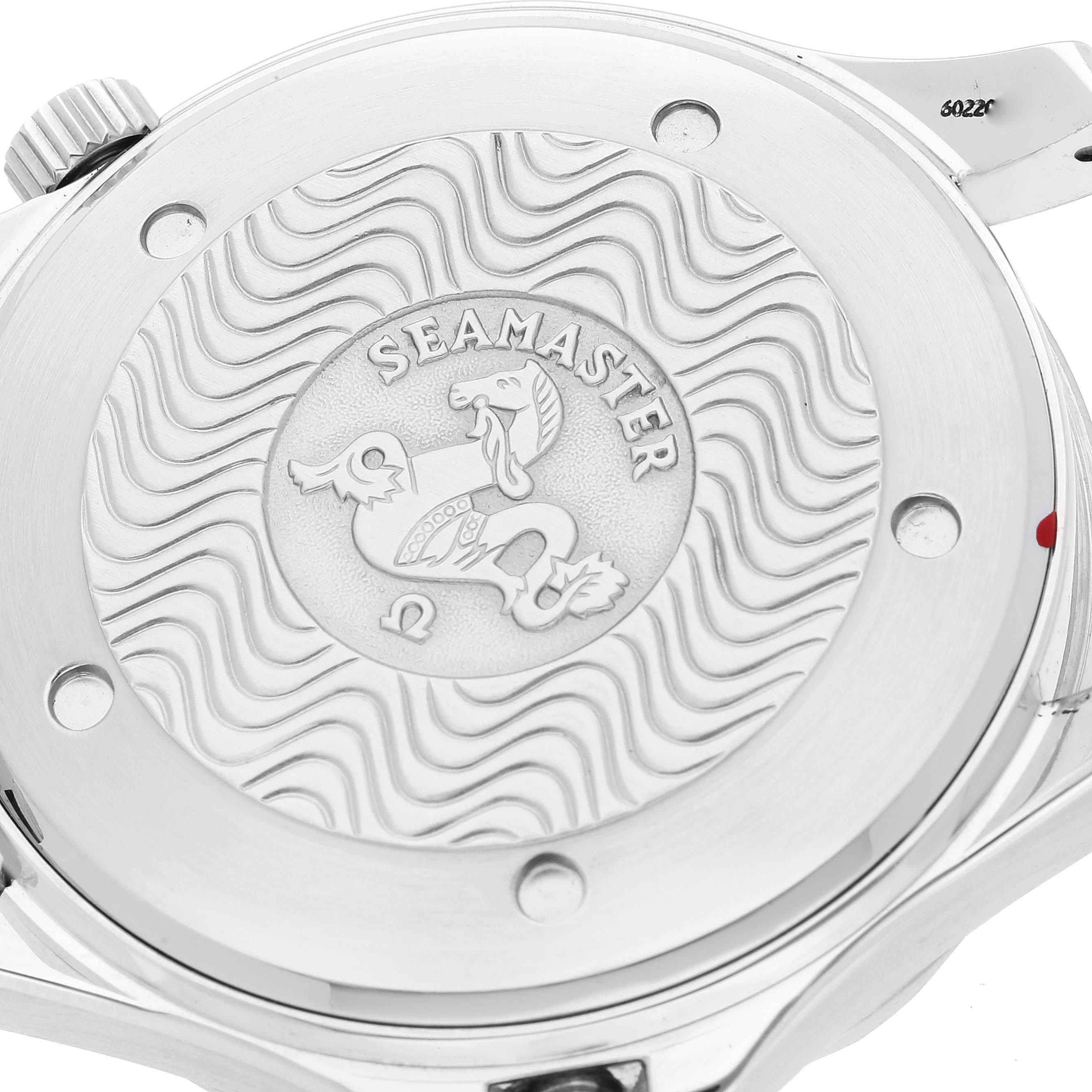 This is a close-up of the case back of an Omega Seamaster 2531.80.00 Men's Stainless Steel Blue Dial 2531.80.00 Men's Stainless Steel Blue Dial watch, showcasing its engraved design and wavy pattern.