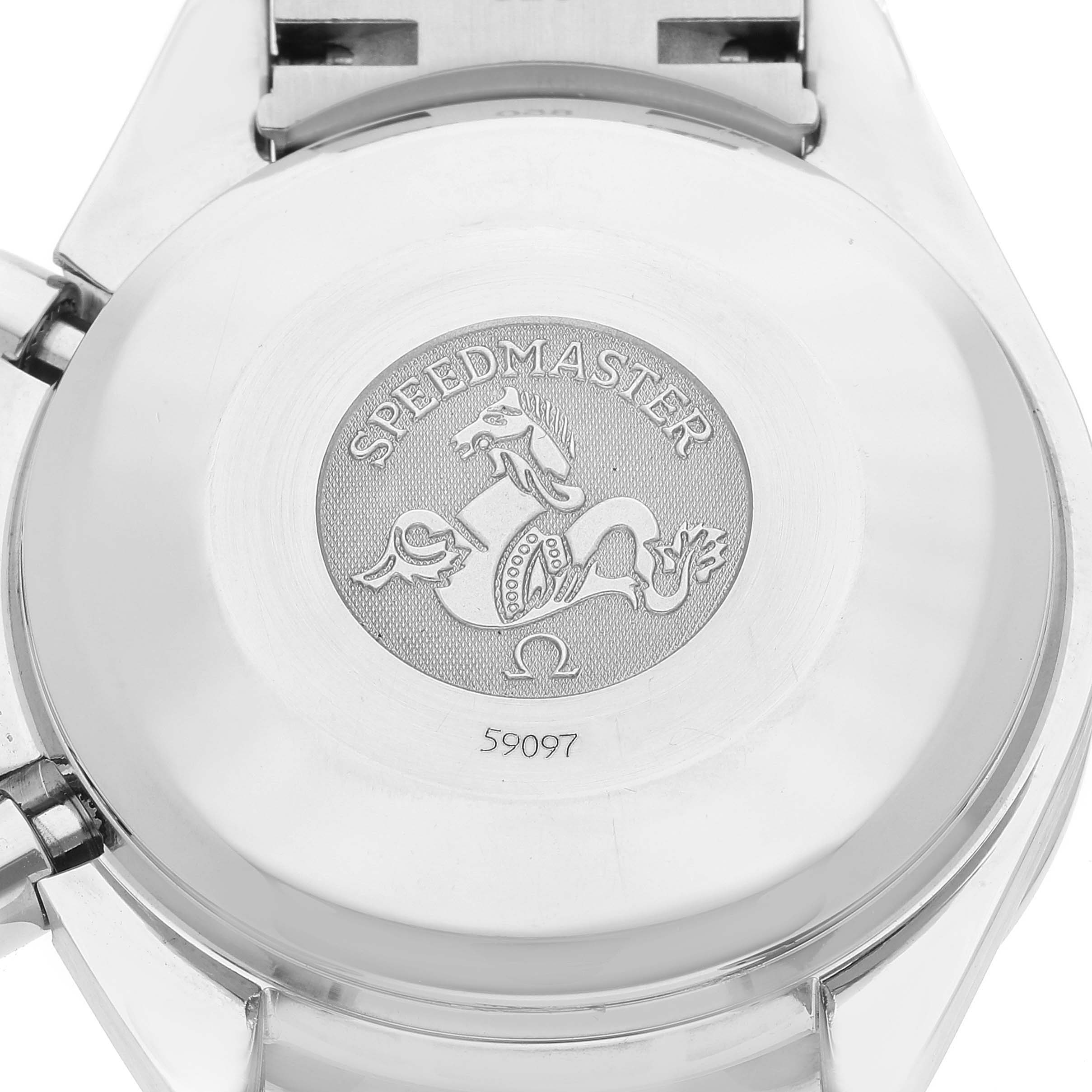 The image displays the case back of an Omega Speedmaster 3513.80.00 Men's Stainless Steel Blue Dial 3513.80.00 Men's Stainless Steel Blue Dial watch at a straight-on angle, showing the engraved label and design.