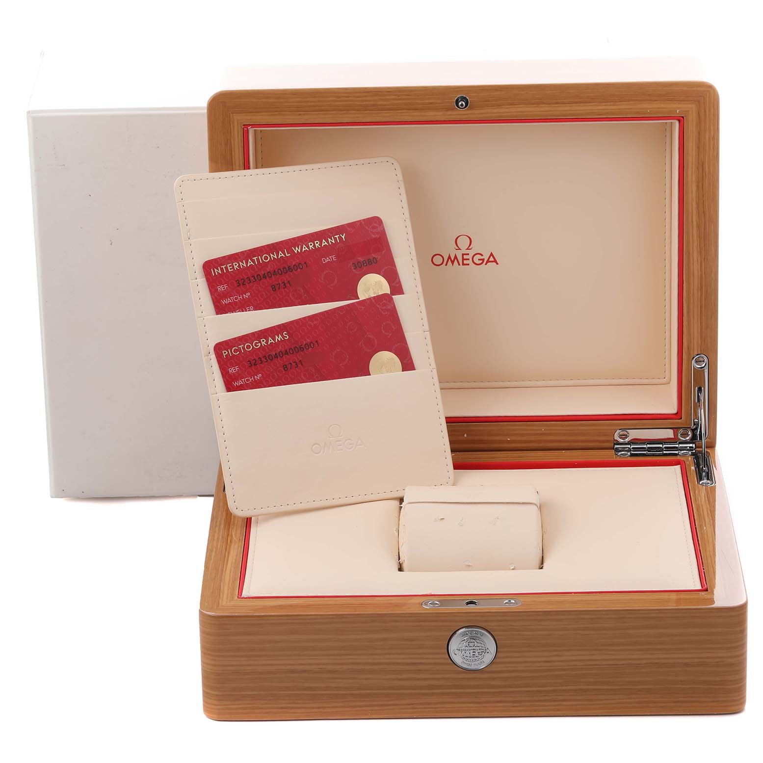 The image shows an Omega Speedmaster 323.30.40.40.06.001 Men's Stainless Steel Grey Dial 323.30.40.40.06.001 Men's Stainless Steel Grey Dial box and warranty cards, viewed from the front with the box lid open.