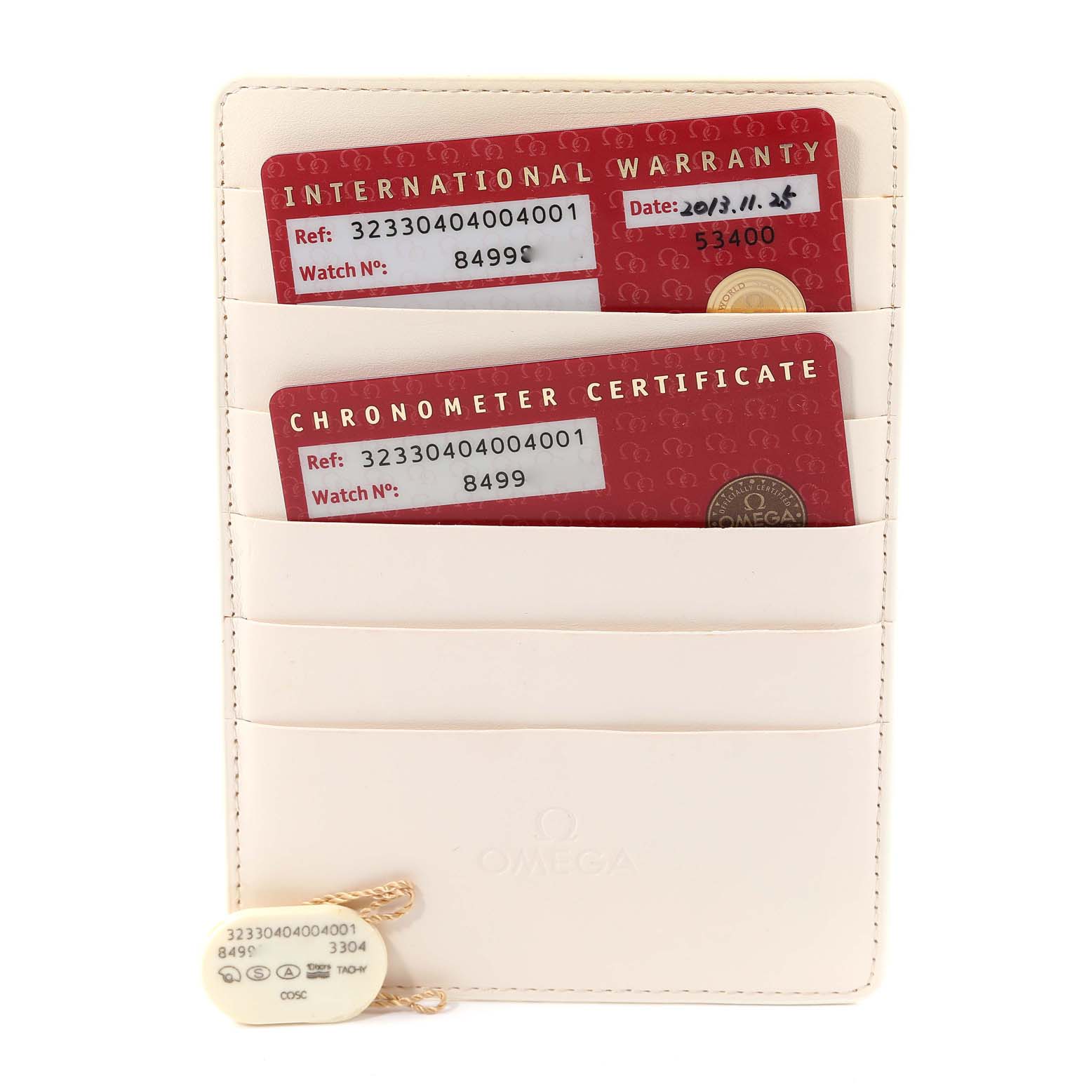 The image shows the warranty and chronometer certificate cards for the Omega Speedmaster 323.30.40.40.04.001 Men's Stainless Steel White Dial 323.30.40.40.04.001 Men's Stainless Steel White Dial, stored in a white cardholder.