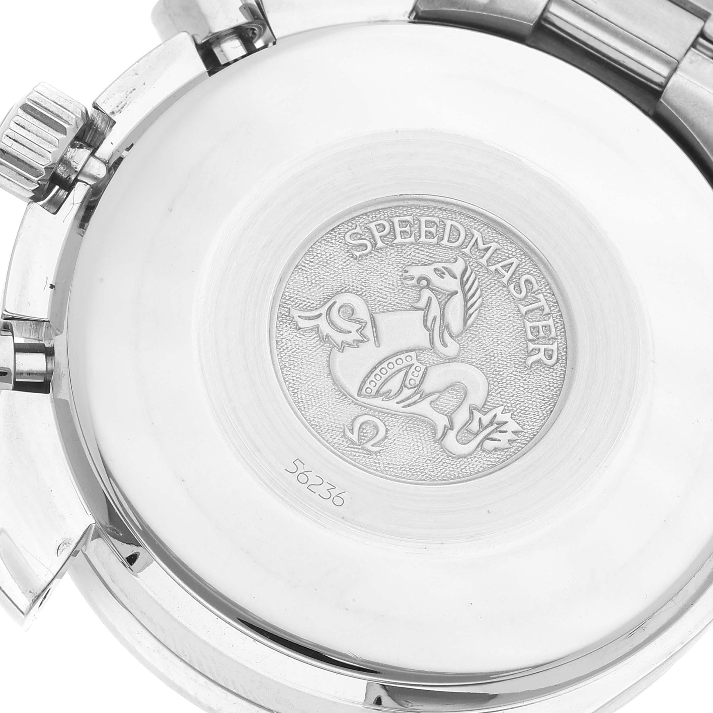 The image shows the case back of an Omega Speedmaster 3510.50.00 Men's Stainless Steel Black Dial 3510.50.00 Men's Stainless Steel Black Dial watch, highlighting its engraved emblem and model name.