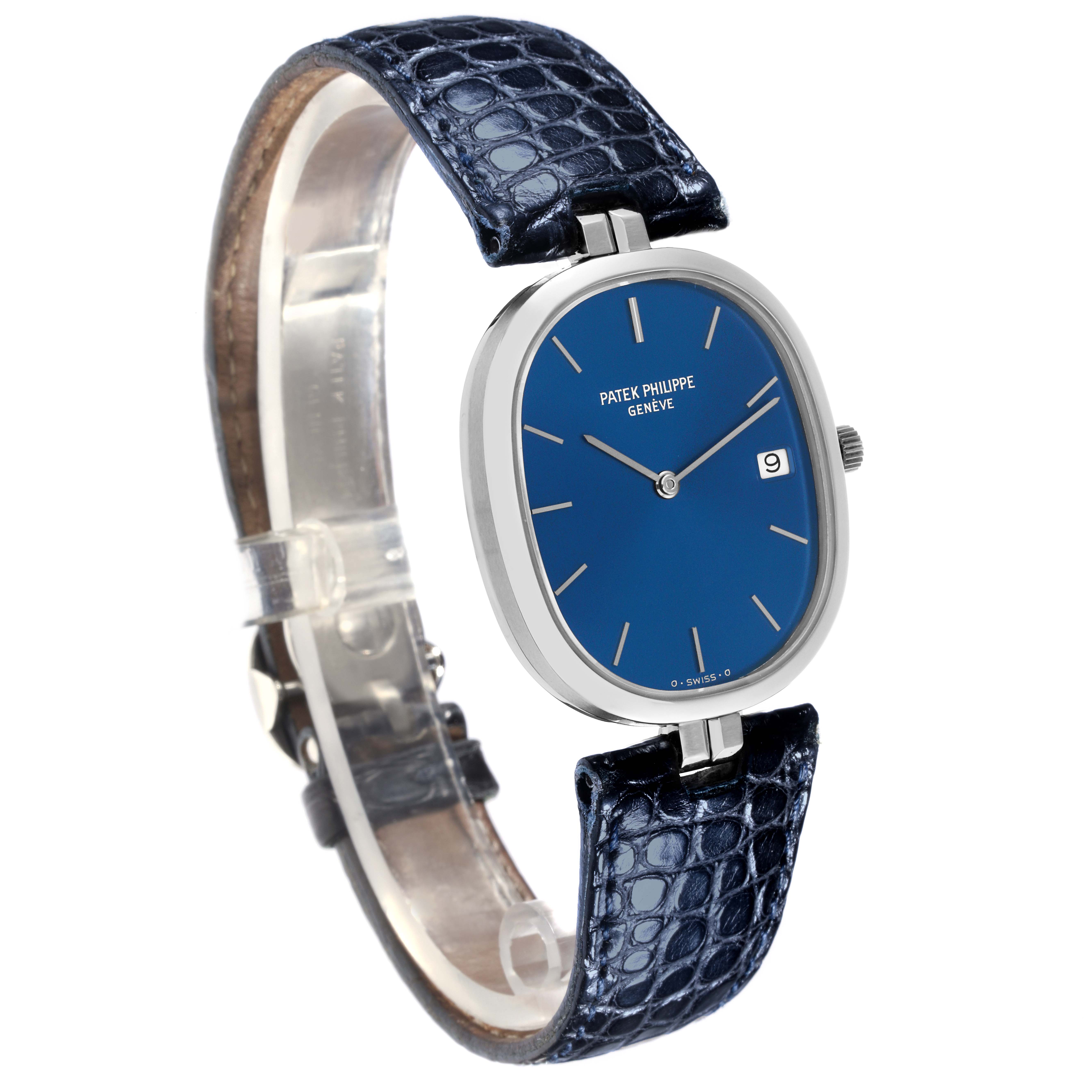 The Patek Philippe Golden Ellipse 3930 Men's Stainless Steel Blue Dial 3930 Men's Stainless Steel Blue Dial watch is shown at an angled side view, highlighting the blue dial and dark leather strap.