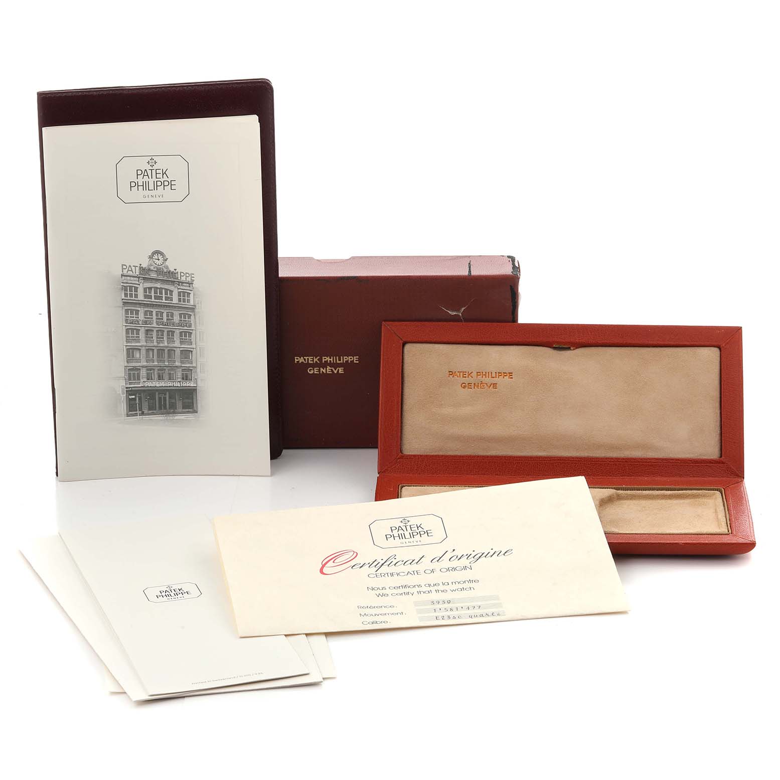 The image shows the packaging and documentation for the Patek Philippe Golden Ellipse 3930 Men's Stainless Steel Blue Dial 3930 Men's Stainless Steel Blue Dial watch, including the box and certificate.