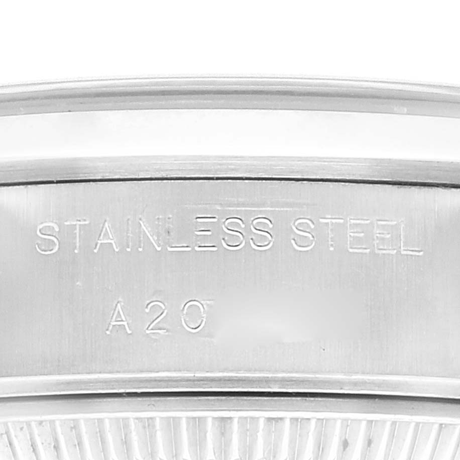 This close-up image shows the stainless steel case back of a Rolex Datejust 69160 Women's Stainless Steel Blue Dial 69160 Women's Stainless Steel Blue Dial watch.