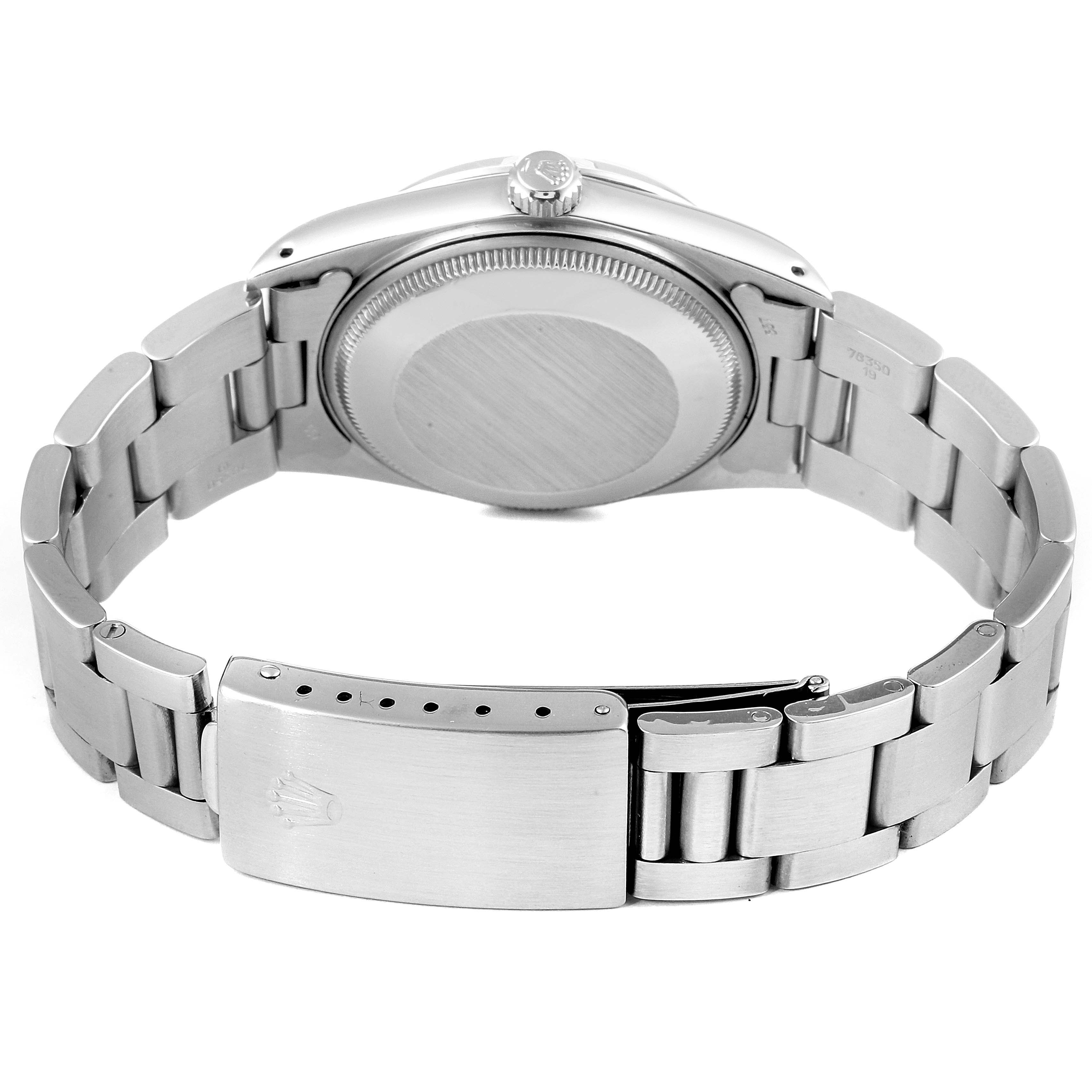 The image shows the back case, crown, and clasp of the Rolex Vintage Collection 15000 Men
s Stainless Steel Champagne Dial 15000 Men
s Stainless Steel Champagne Dial watch.