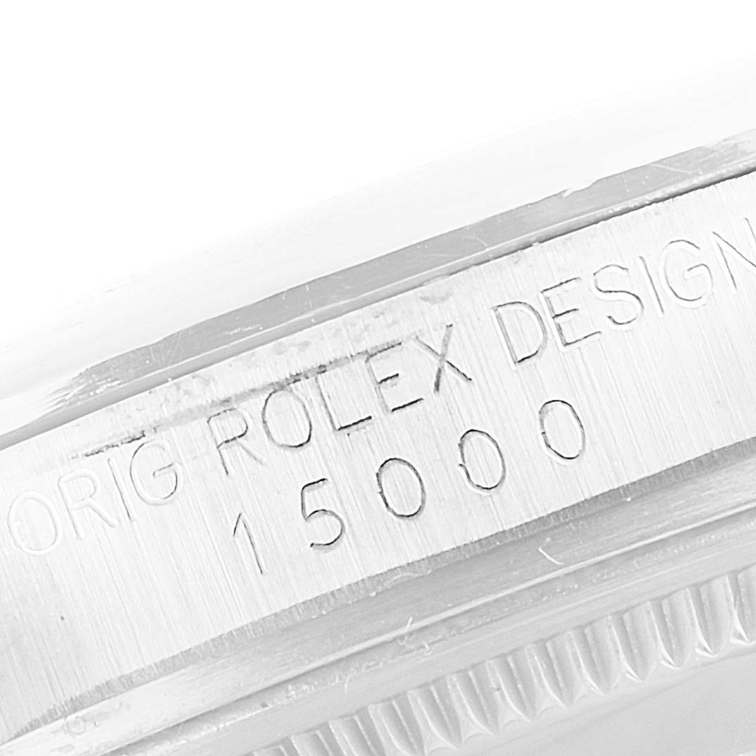 The image shows a close-up angle of the case side of a Vintage Collection model by Rolex, displaying its serial number.