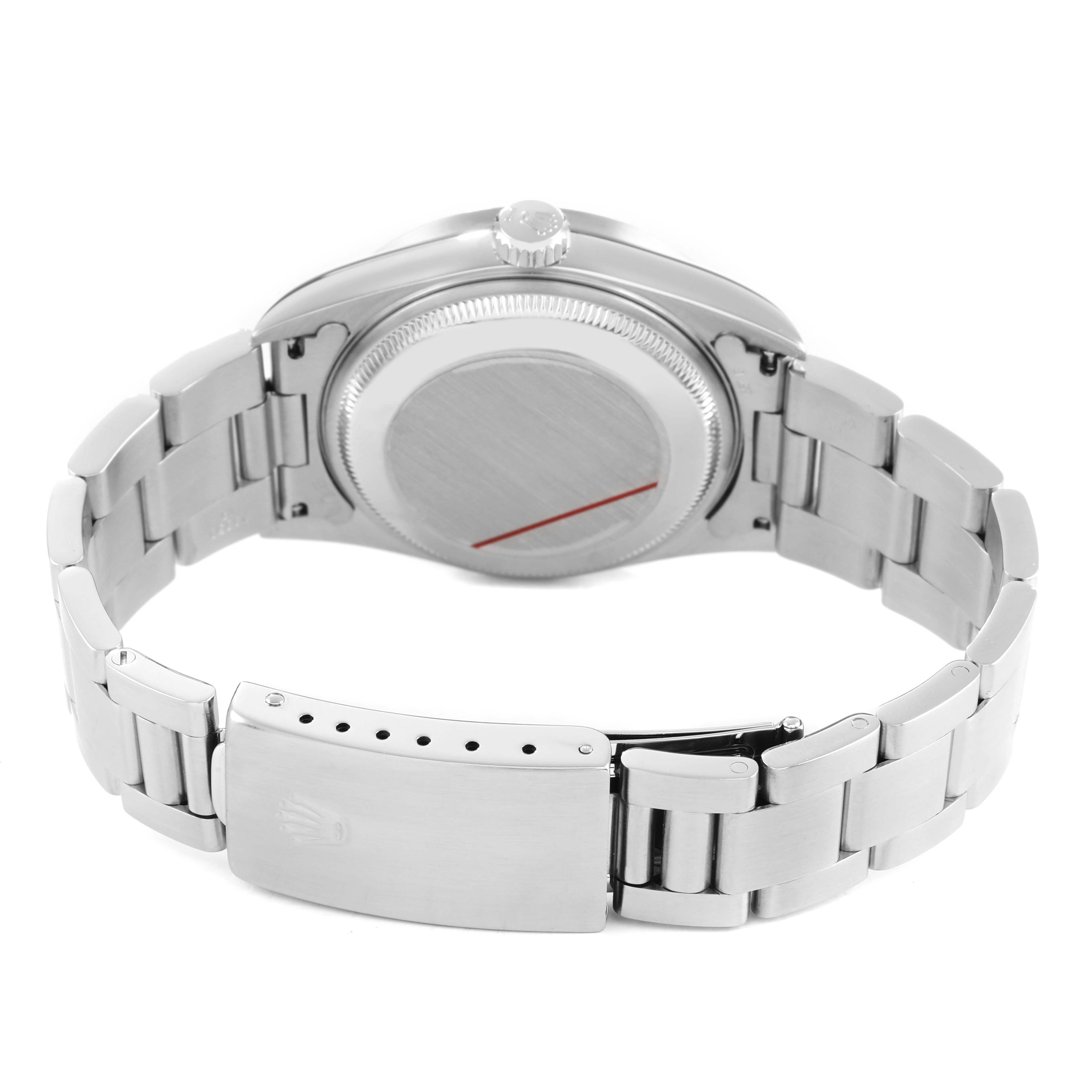 The image shows the back and clasp of a Rolex Date 15210 Men's Stainless Steel Silver Dial model watch, highlighting the case back and bracelet.