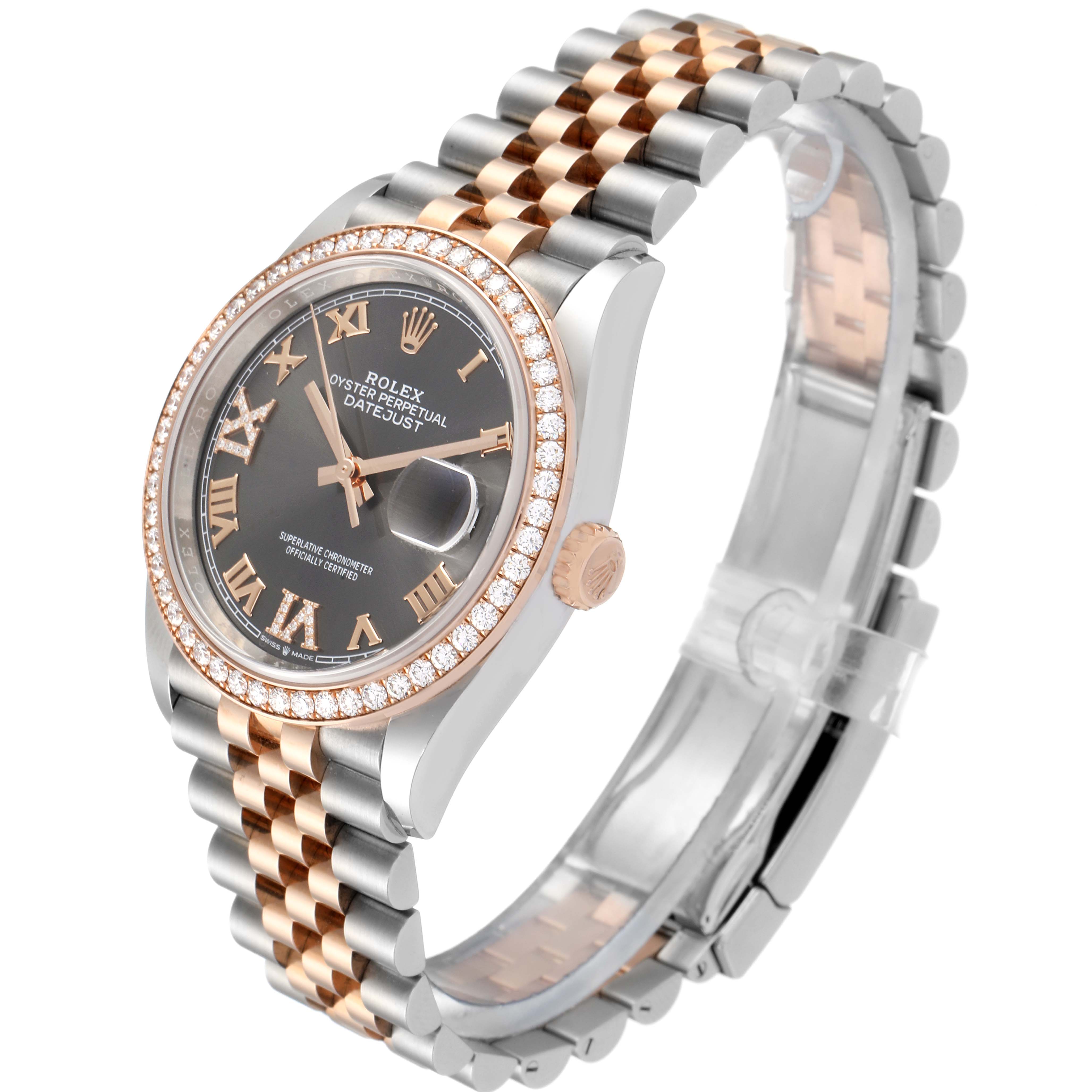 The image shows a Rolex Datejust 126281 Men
s Steel and Gold (two tone) Grey Dial 126281 Men
s Steel and Gold (two tone) Grey Dial watch at an angle highlighting its two-tone bracelet, diamond bezel, and black dial with Roman numerals.