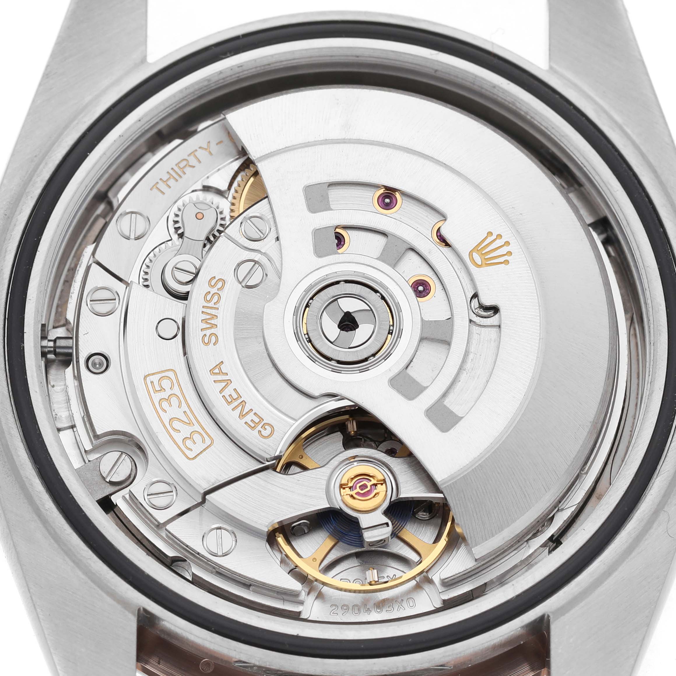 The Rolex Datejust 41 126331 Men's Steel and Gold (two tone) Grey Dial is shown from the back, displaying its intricate movement and rotor mechanism.