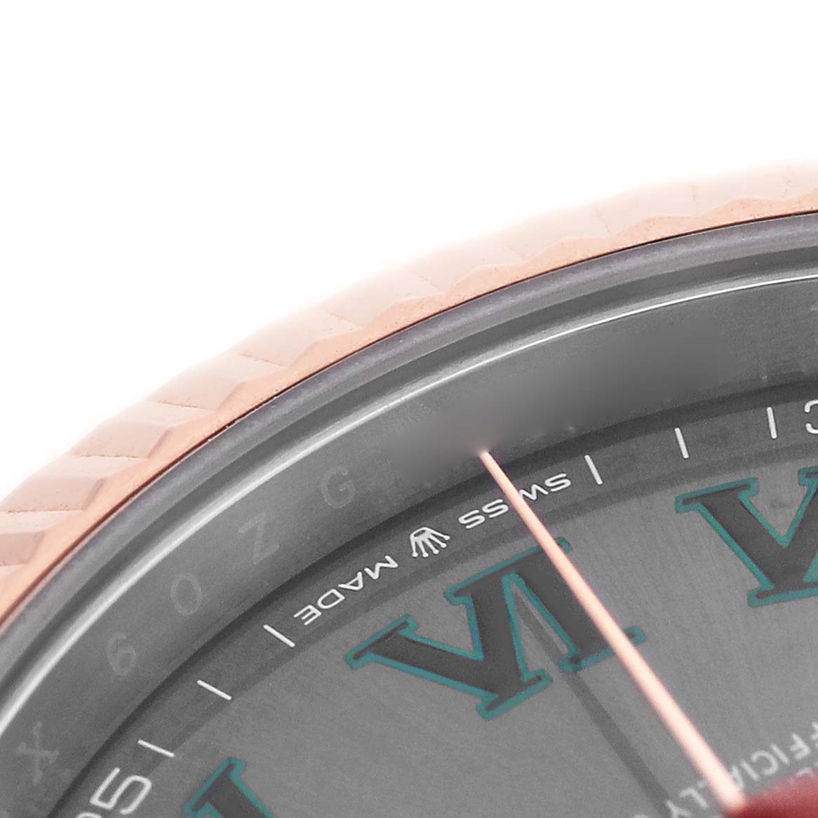 The image shows a close-up of the Rolex Datejust 41 126331 Men's Steel and Gold (two tone) Grey Dial watch's bezel and dial edge, highlighting the "Swiss Made" text and Roman numerals.