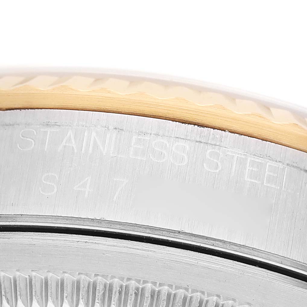 The image shows a close-up of the Rolex Datejust 16233 Men's Steel and Gold (two tone) Champagne Dial model's side, focusing on the stainless steel and gold bezel.
