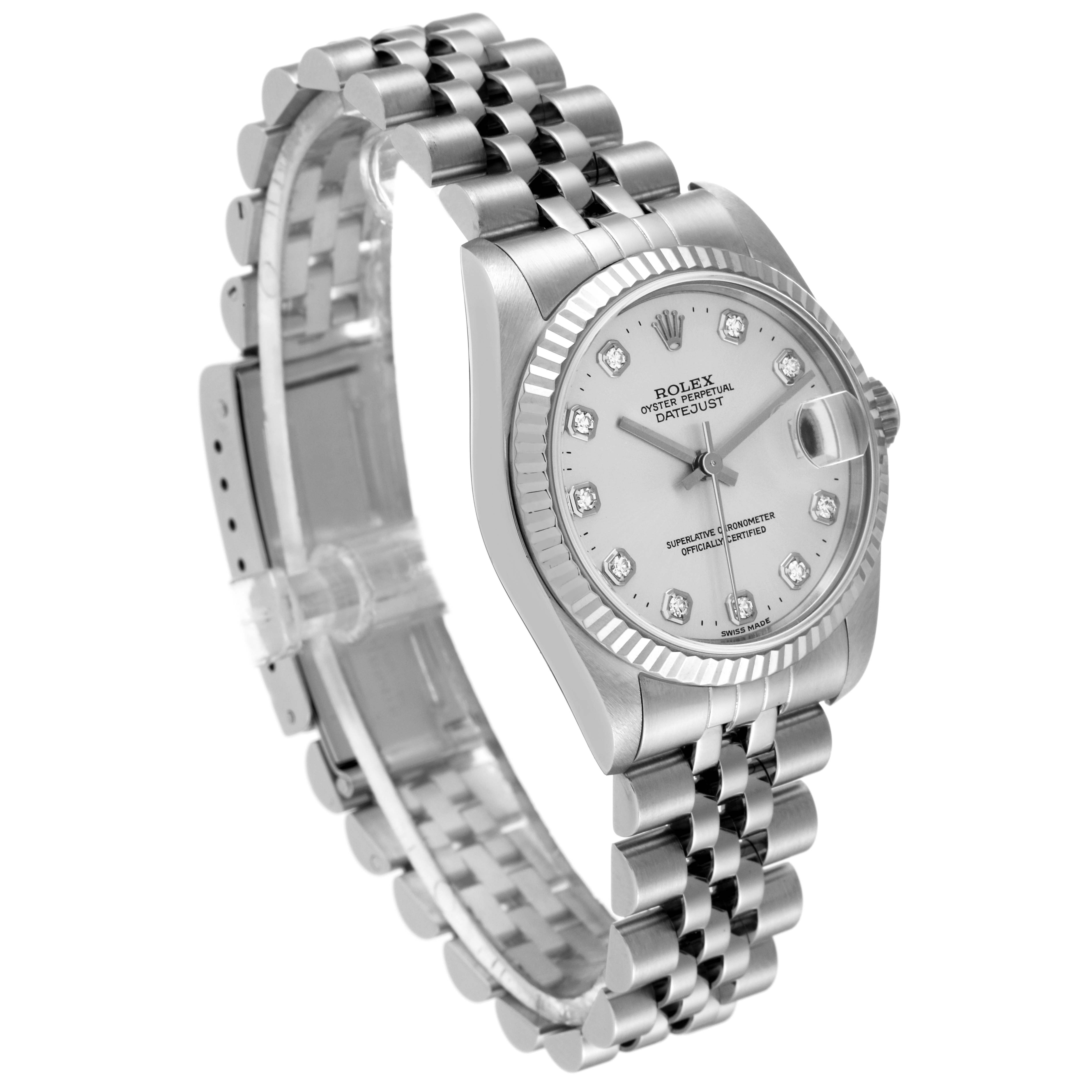 This mid-size Rolex Datejust watch is shown at an angle, highlighting its bracelet, case, dial, and fluted bezel.