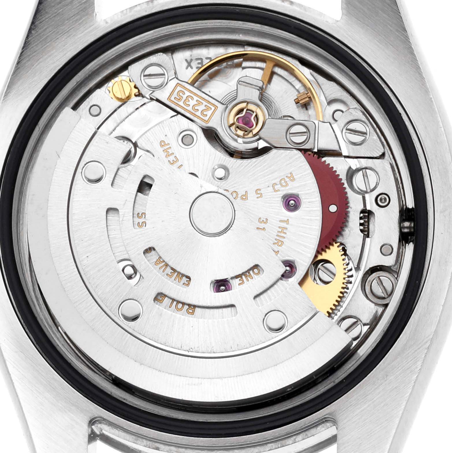 The image shows the movement of a Rolex Datejust 179174 Women
s Stainless Steel Silver Dial 179174 Women
s Stainless Steel Silver Dial watch from the back, detailing the internal mechanics.