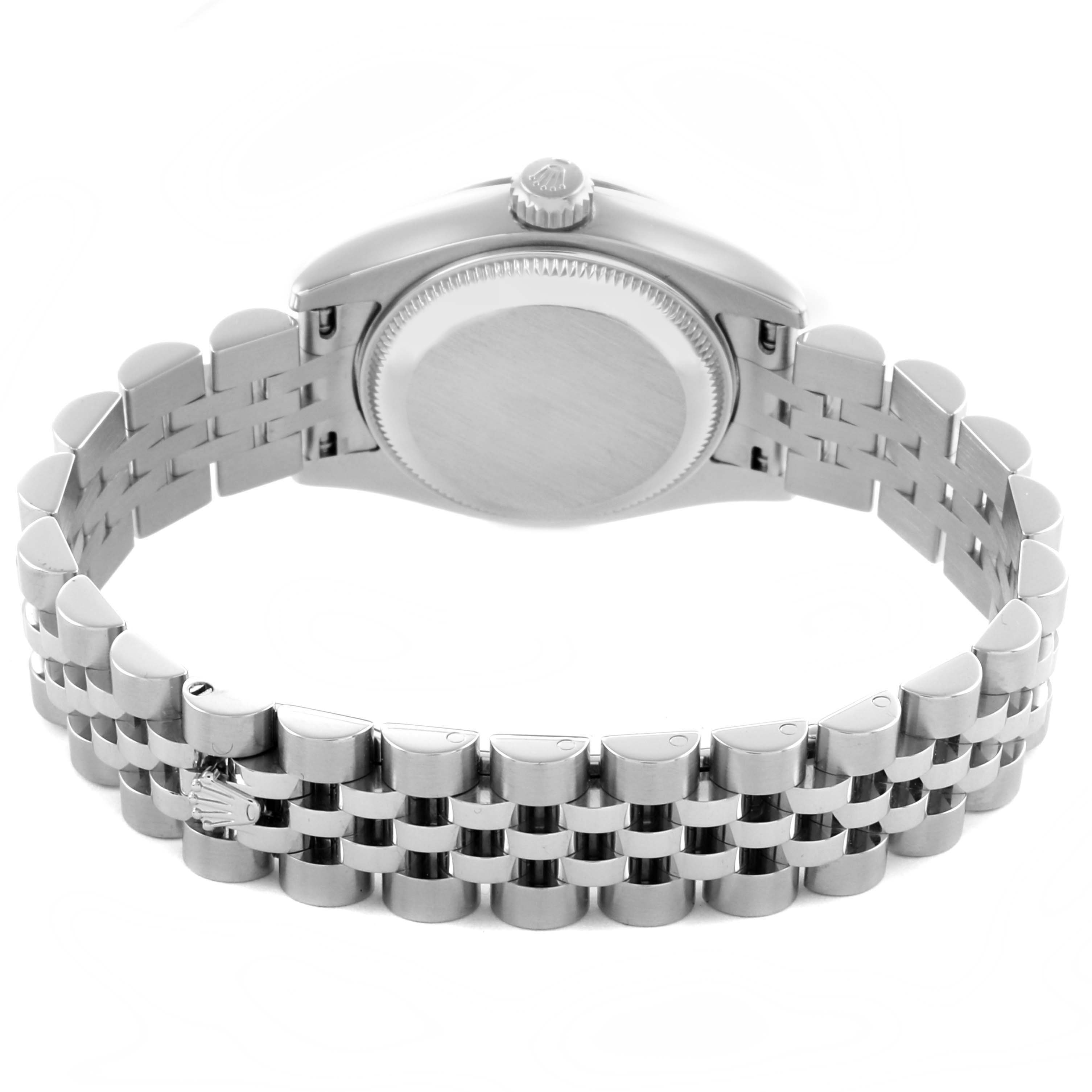 The image shows a rear view of a Rolex Datejust 179174 Women
s Stainless Steel Silver Dial 179174 Women
s Stainless Steel Silver Dial watch with a clear view of the case back and jubilee bracelet.