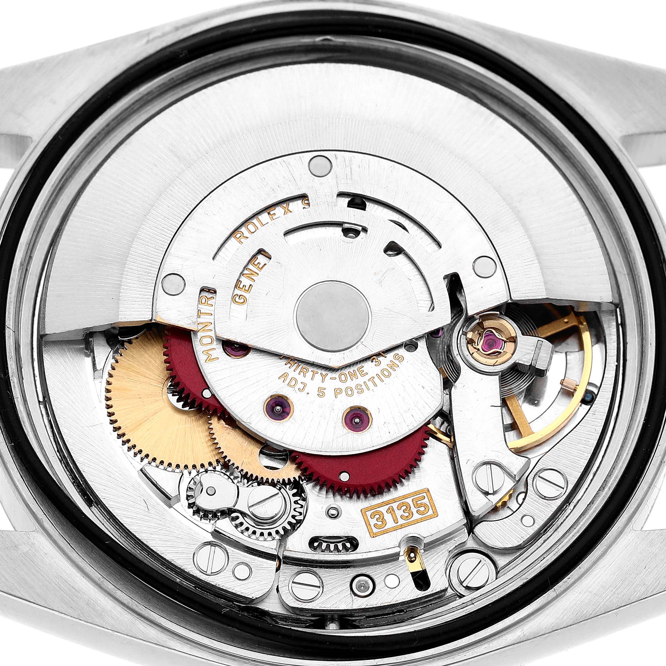 The image shows an inner view of a Rolex Datejust 16200 Men's Stainless Steel White Dial's movement mechanism, featuring gears and the "3135" caliber.