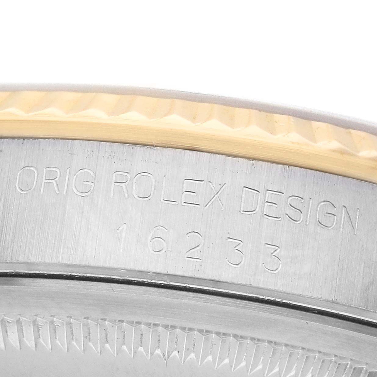 The image shows a close-up of the Rolex Datejust 16233 Men's Steel and Gold (two tone) Champagne Dial model, focusing on the engraved case side with the design number.