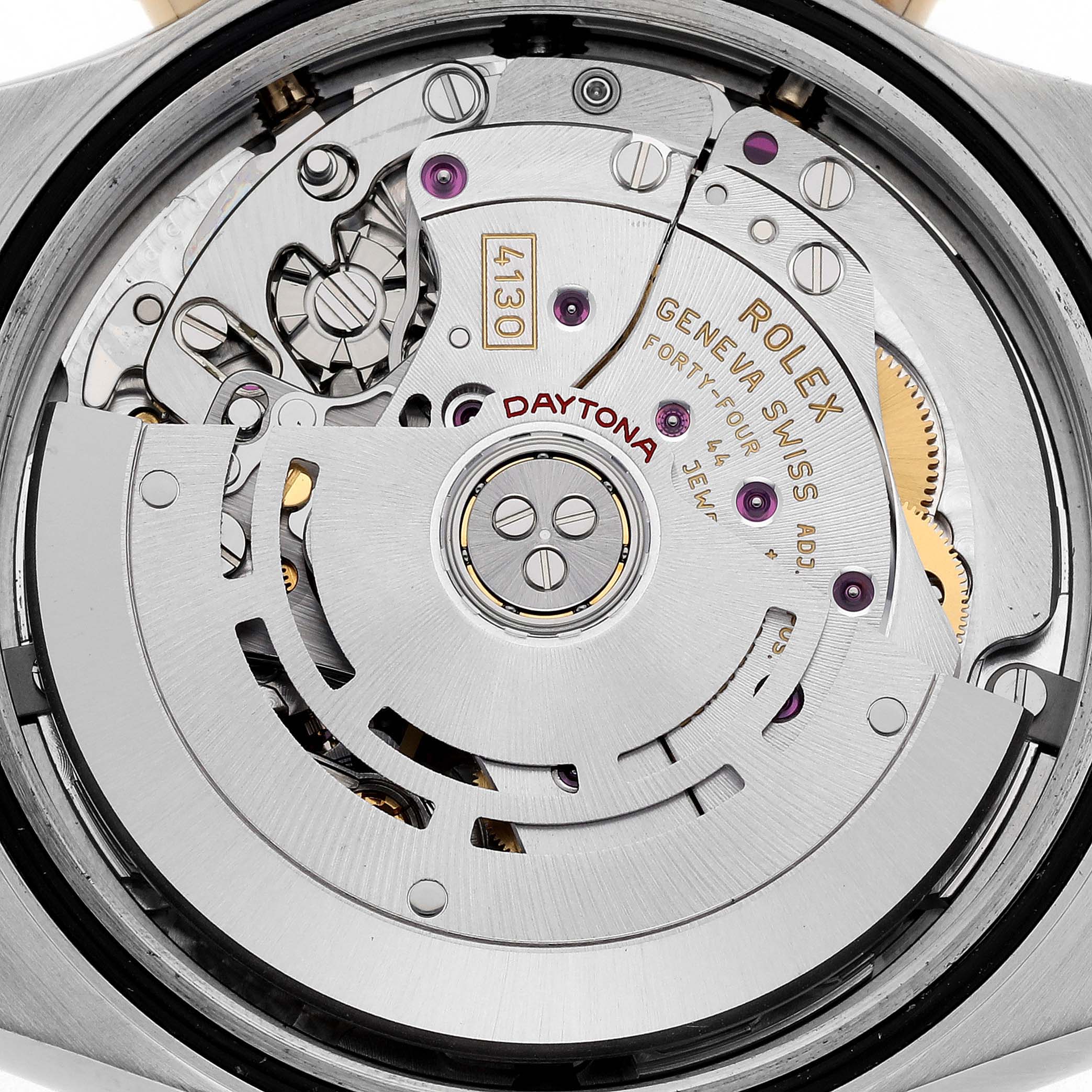 The image shows the movement of a Rolex Daytona 116503-0004 Men's Steel and Gold (two tone) Black Dial 116503-0004 Men's Steel and Gold (two tone) Black Dial watch from a top-down angle, highlighting the intricate mechanism and rotor.