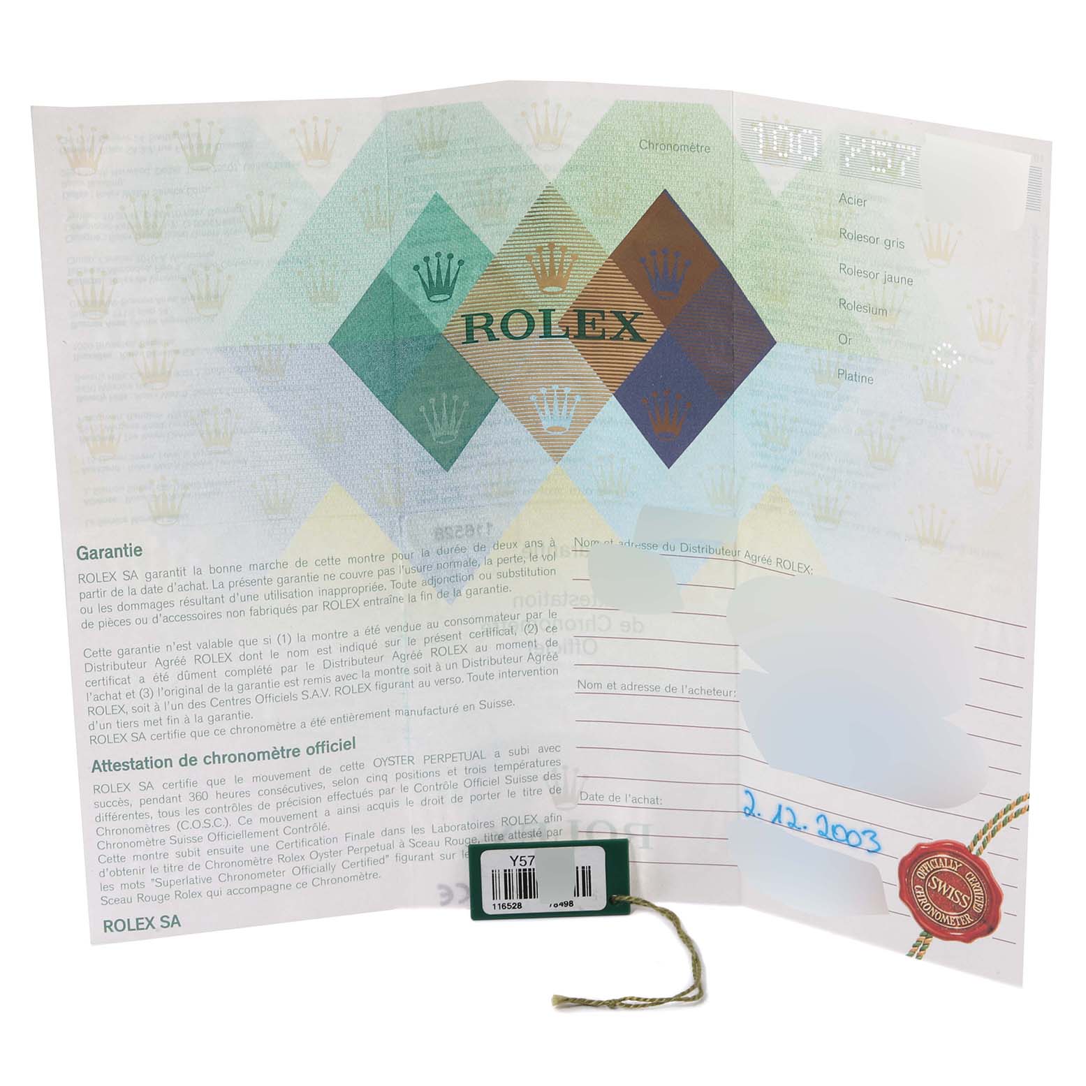 The image shows a Rolex warranty document and tag for the Daytona model, with branding and purchase details.
