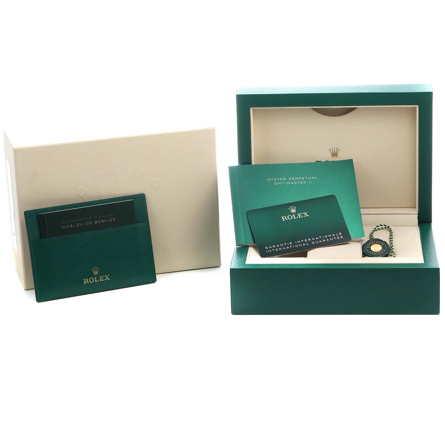 The image shows the packaging and accessories of a Rolex GMT-Master 126710 Men's Stainless Steel Black Dial, including the box, guarantee manual, and tags.