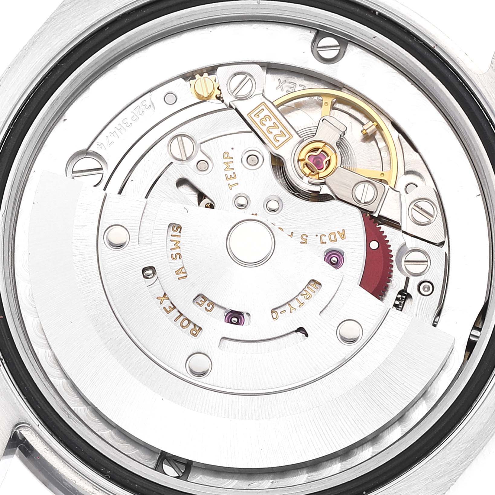 This is a close-up view of the internal mechanism of a Rolex Mid-Size 177200 Women
s Stainless Steel White Dial 177200 Women
s Stainless Steel White Dial watch, showcasing the intricate movement components.