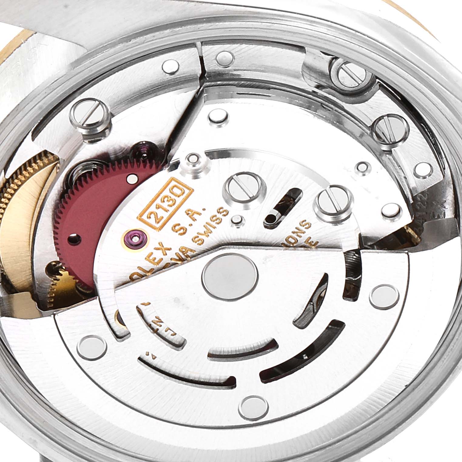 This image shows the inner mechanical movement of a Rolex Oyster Perpetual 67183 Women's Steel and Gold (two tone) Champagne Dial 67183 Women's Steel and Gold (two tone) Champagne Dial watch, specifically the rotor and gears.
