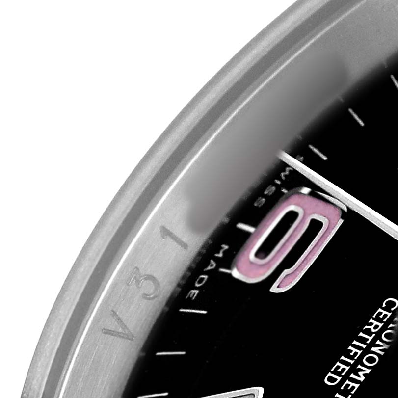 The image shows a close-up of the Rolex Oyster Perpetual 116034 Men's Stainless Steel Black Dial's dial and bezel, highlighting the edge details and numerals.