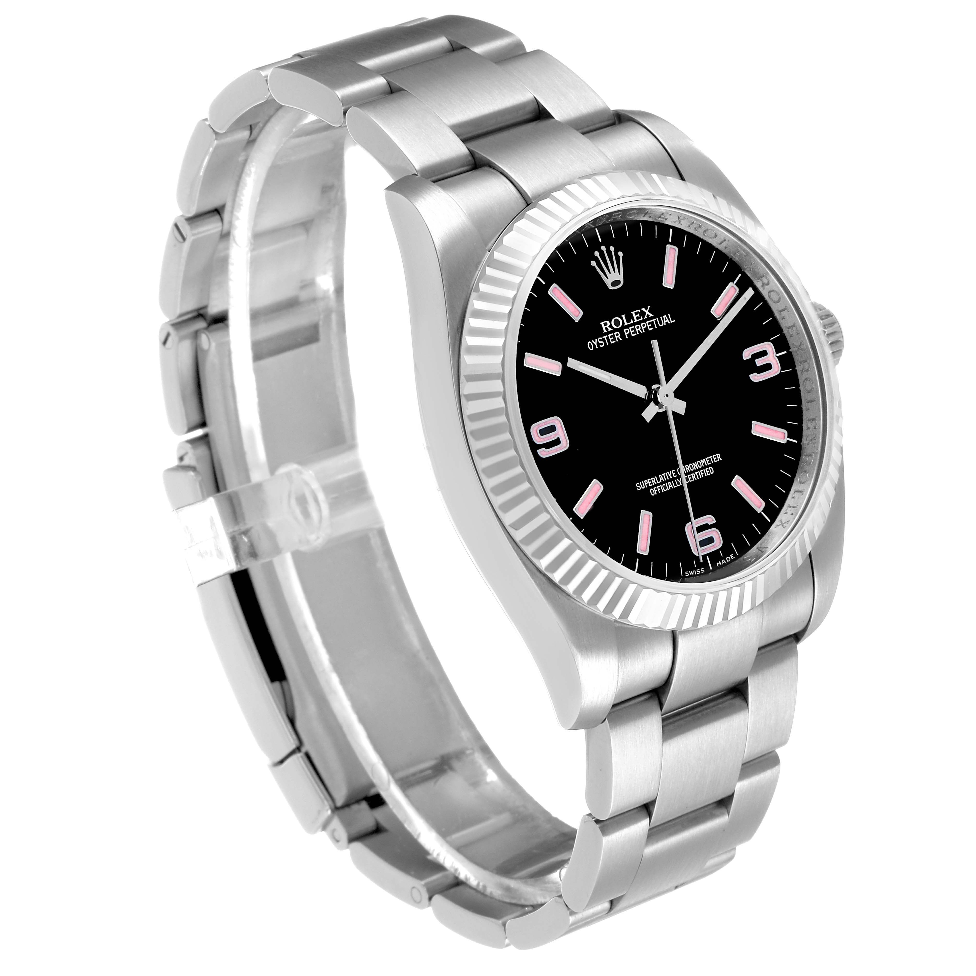 The image shows a side angle of the Rolex Oyster Perpetual 116034 Men's Stainless Steel Black Dial watch, displaying the black dial, pink indices, case, and bracelet.