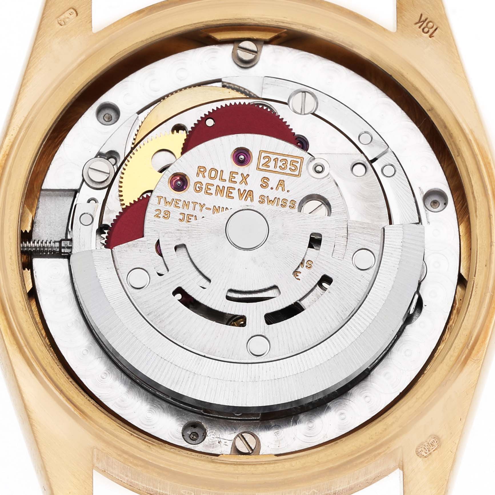 The image shows the movement of a Rolex President 68278 Women's Yellow Gold White Dial model from the back, highlighting its internal mechanical components.