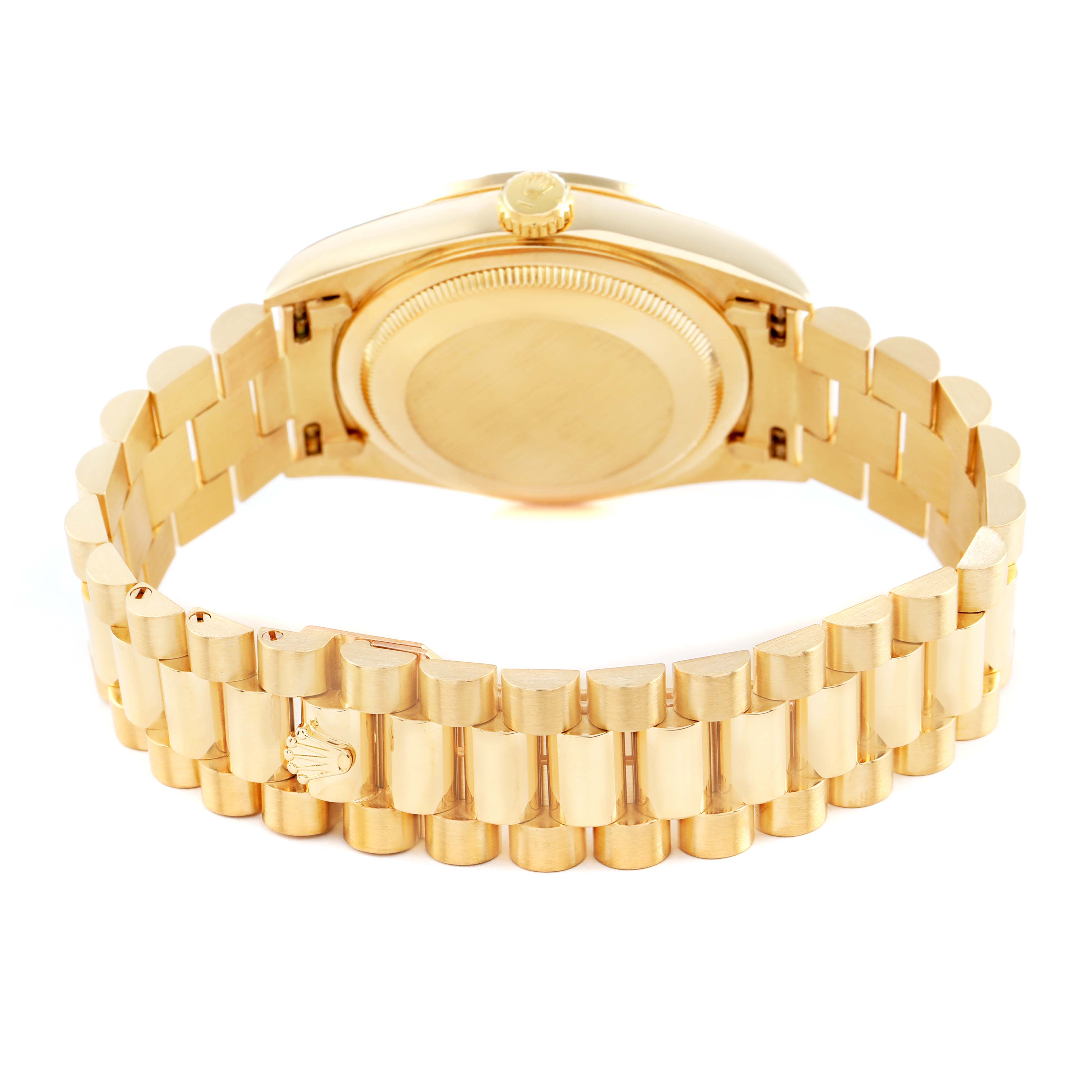 The Rolex President 18348 Men's Yellow Gold Champagne Dial model watch is shown from the back, displaying its bracelet, case back, and crown.