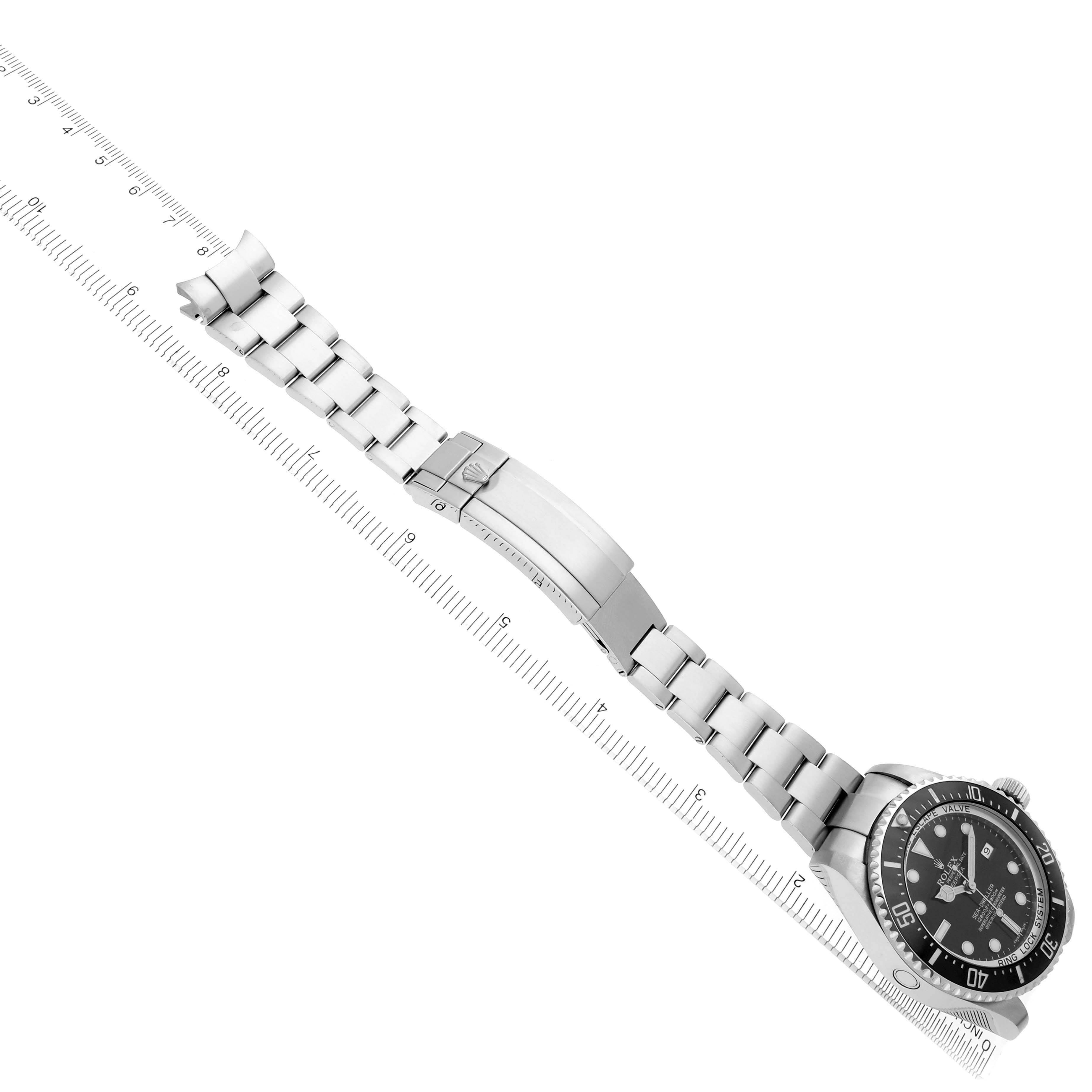 The Rolex Sea-Dweller 116660 Men's Stainless Steel Black Dial 116660 Men's Stainless Steel Black Dial watch is displayed at an angle showing its full bracelet and clasp, with a focus on the face and bezel.