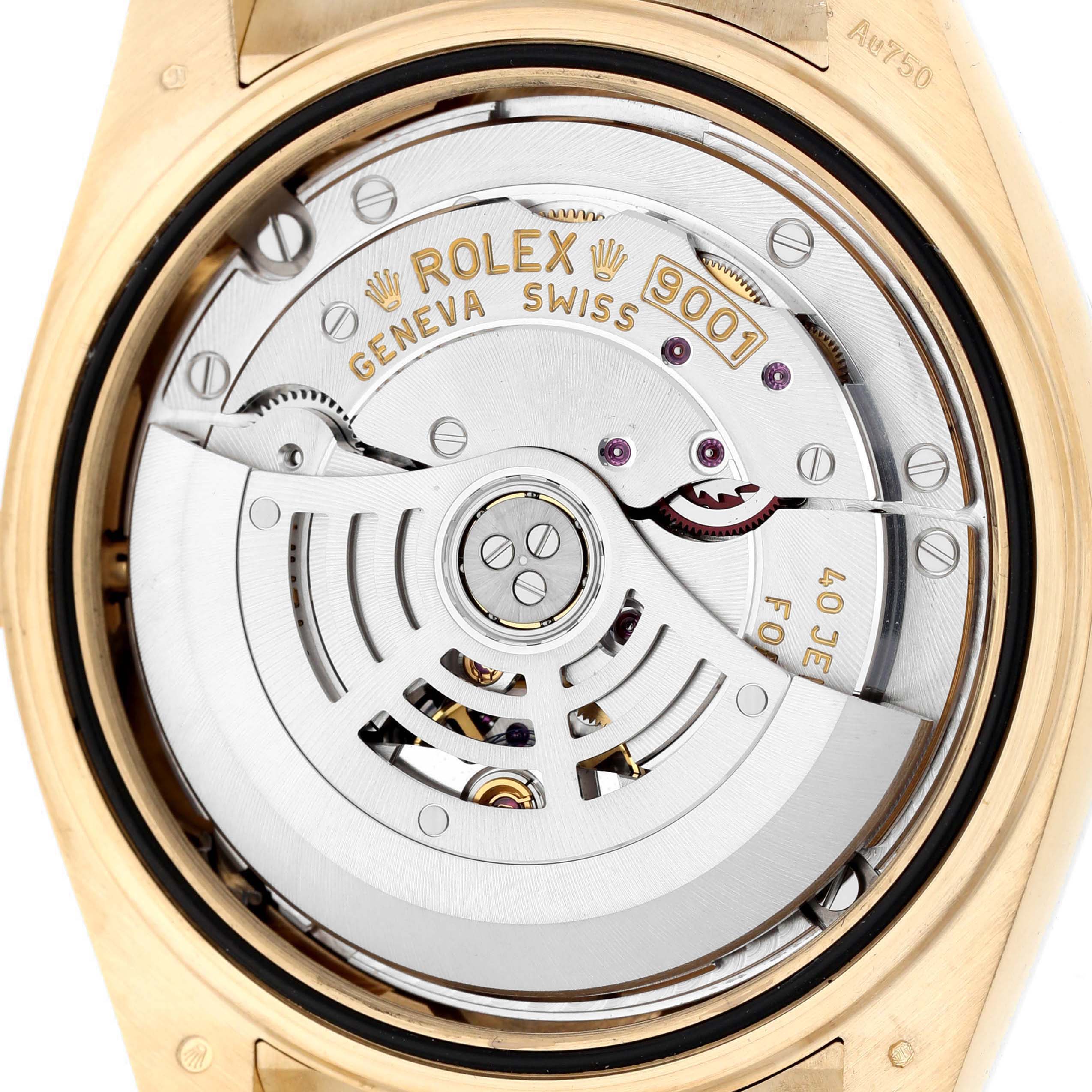 The image shows the movement of a Rolex Sky-Dweller 326238 Men's Yellow Gold Black Dial, viewed from the back.