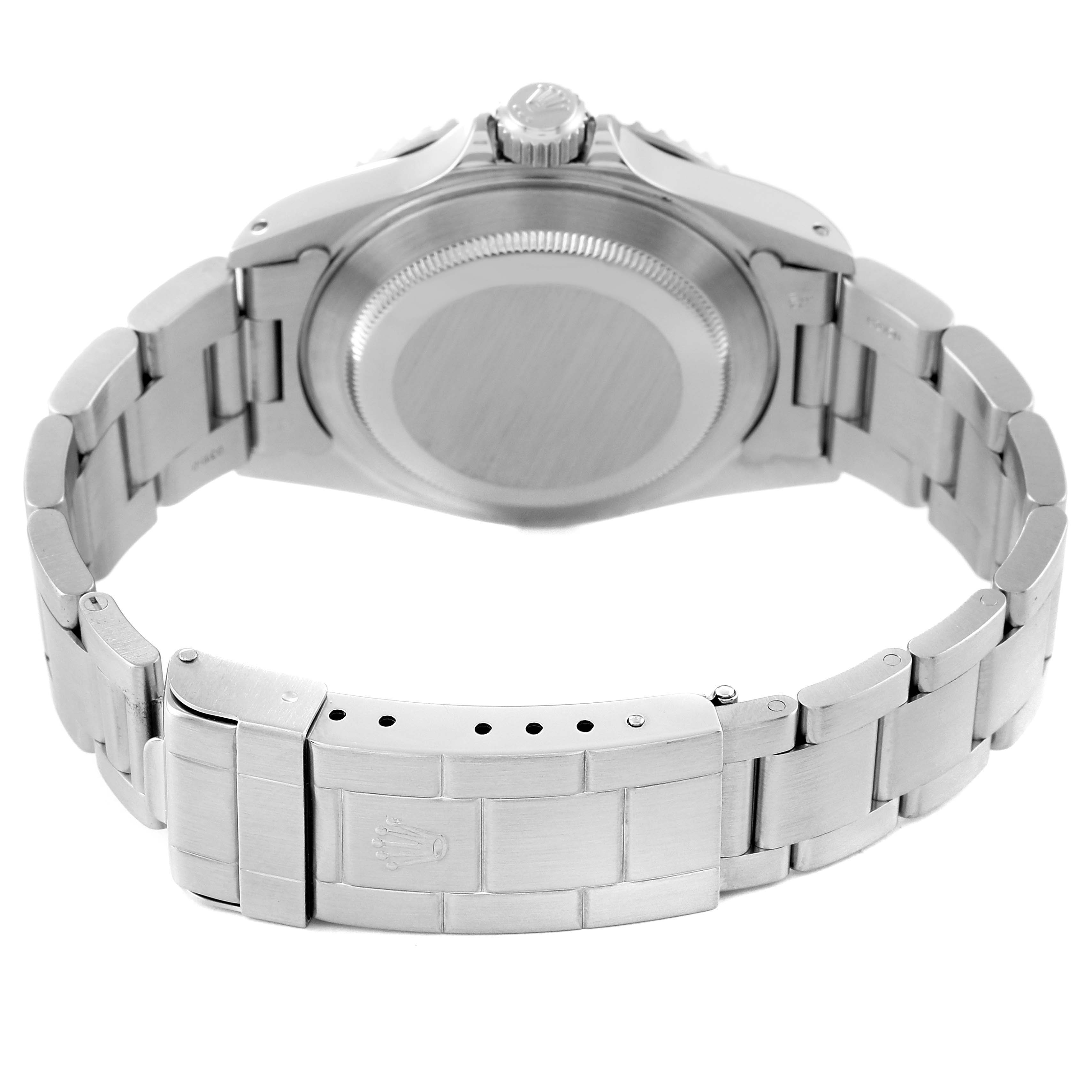 This image shows the back case and bracelet clasp of a Rolex Submariner 14060M Men
s Stainless Steel Black Dial 14060M Men
s Stainless Steel Black Dial watch, viewed from the underside.