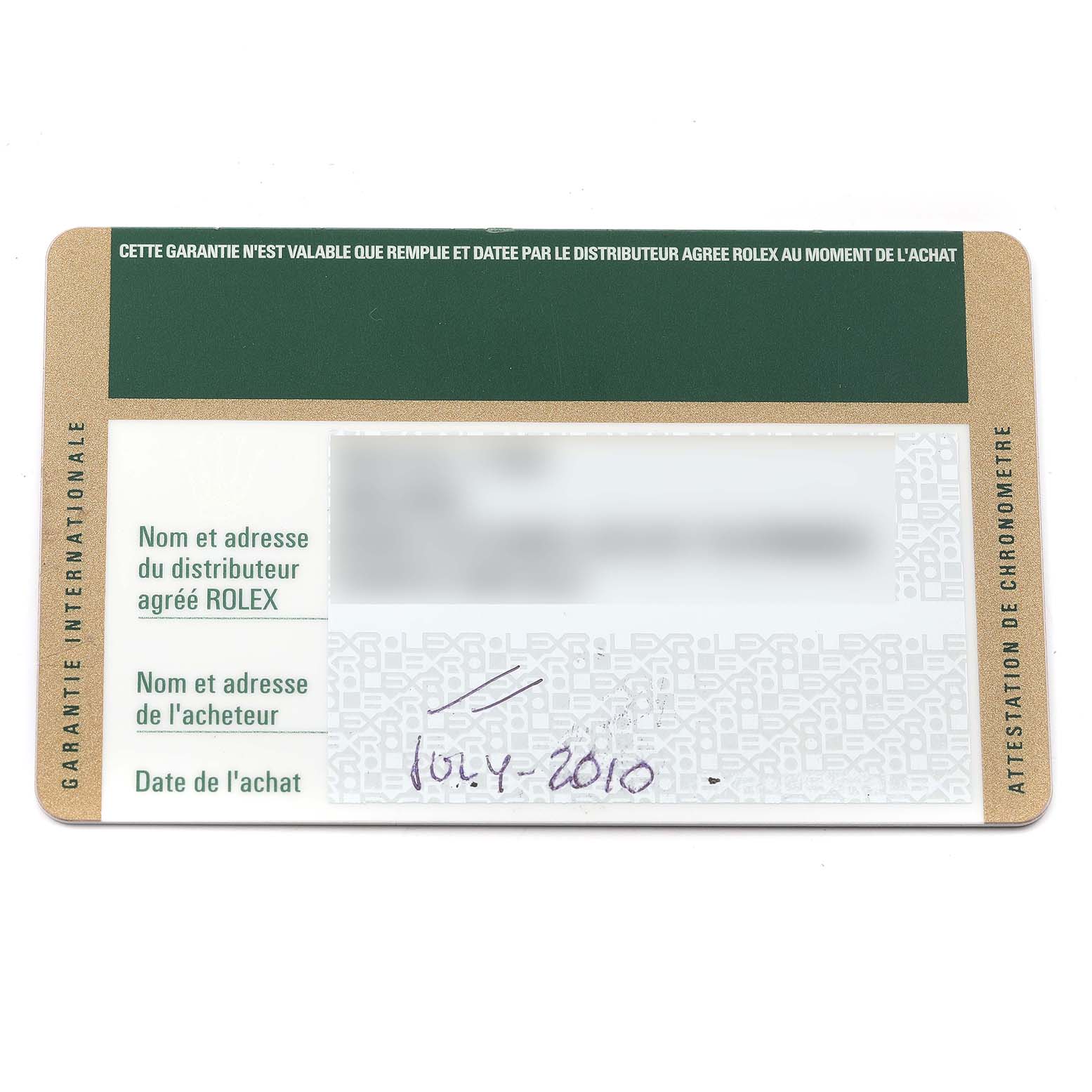 The image shows the guarantee documentation card for a Rolex Submariner 14060M Men
s Stainless Steel Black Dial 14060M Men
s Stainless Steel Black Dial watch, viewed from the top.