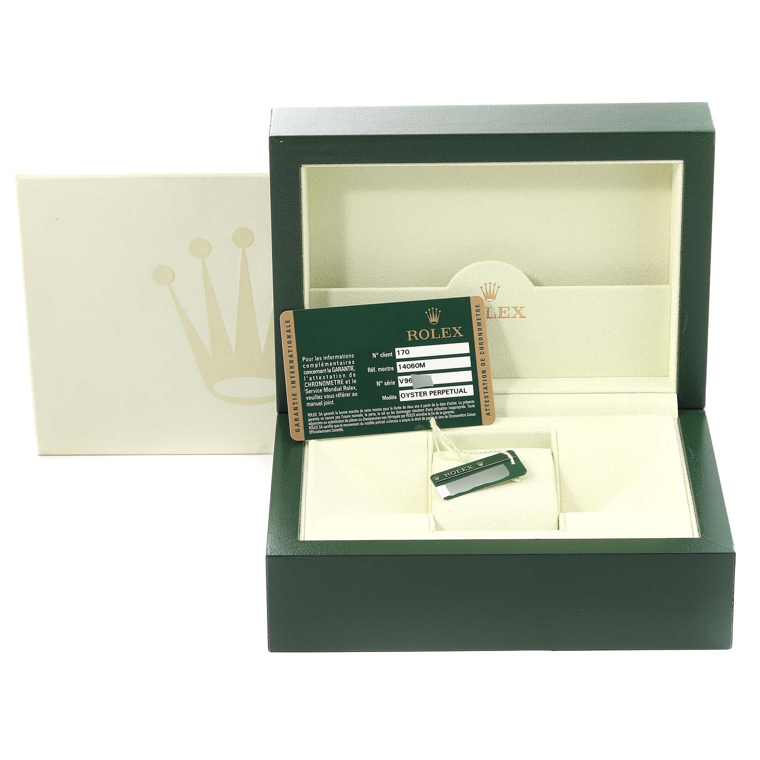 The image shows the packaging and accessories including a guarantee card for a Rolex Submariner 14060M Men
s Stainless Steel Black Dial 14060M Men
s Stainless Steel Black Dial model, with the box open.