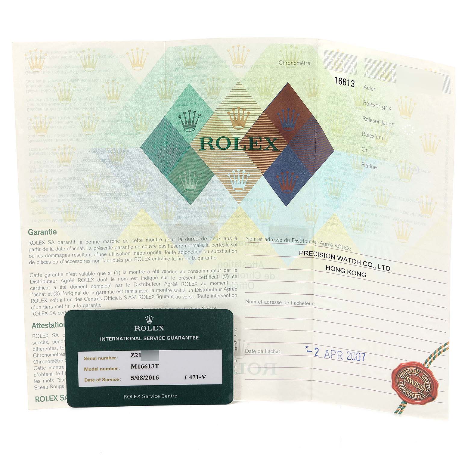 The image shows the certification and international service guarantee card for a Rolex Submariner 16613 Men
s Steel and Gold (two tone) Blue Dial 16613 Men
s Steel and Gold (two tone) Blue Dial M16613T.