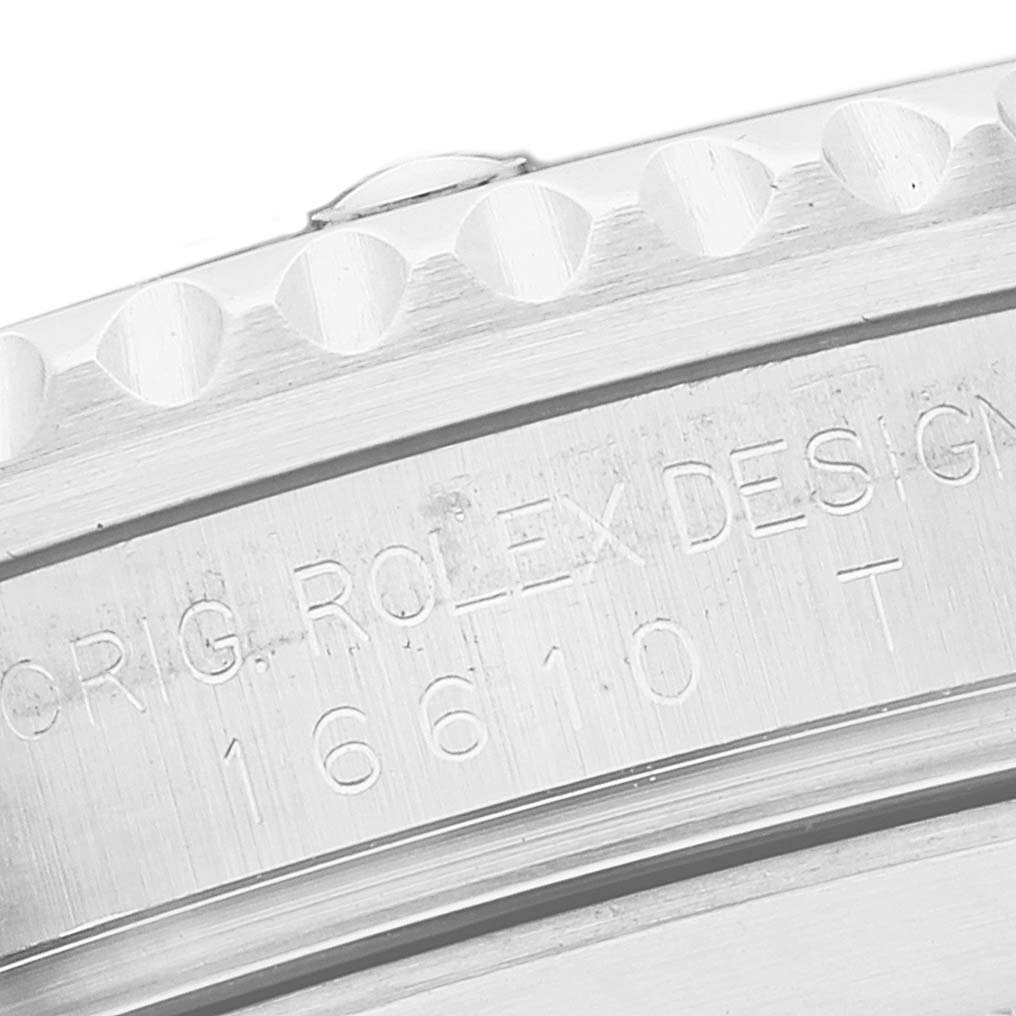 The image shows a close-up of the case back and reference number engraving of a Rolex Submariner 16610T Men's Stainless Steel Black Dial 16610T Men's Stainless Steel Black Dial model.