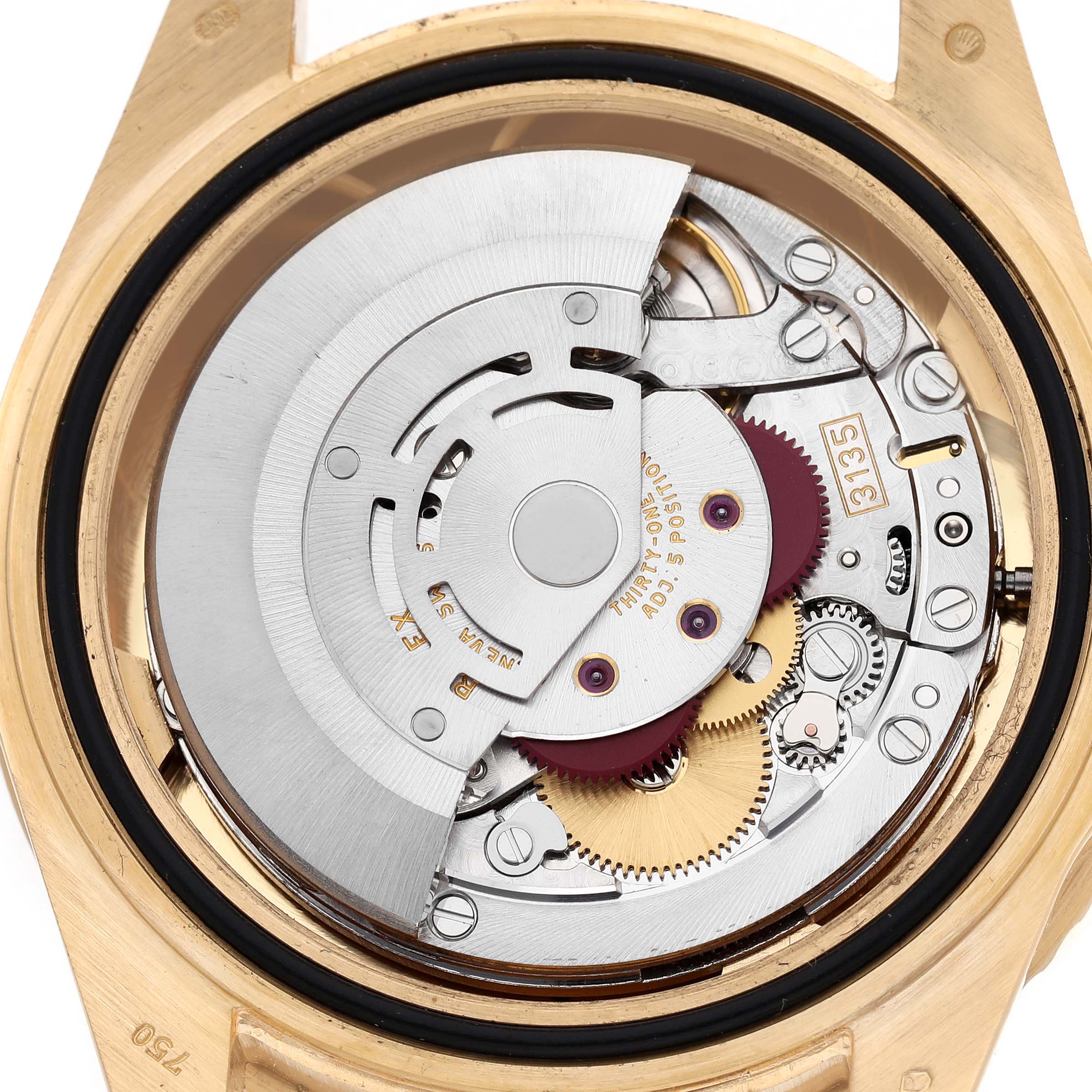 The image shows the internal movement mechanism of a Rolex Submariner 16618 Men's Yellow Gold Blue Dial watch from a rear angle without the case back.