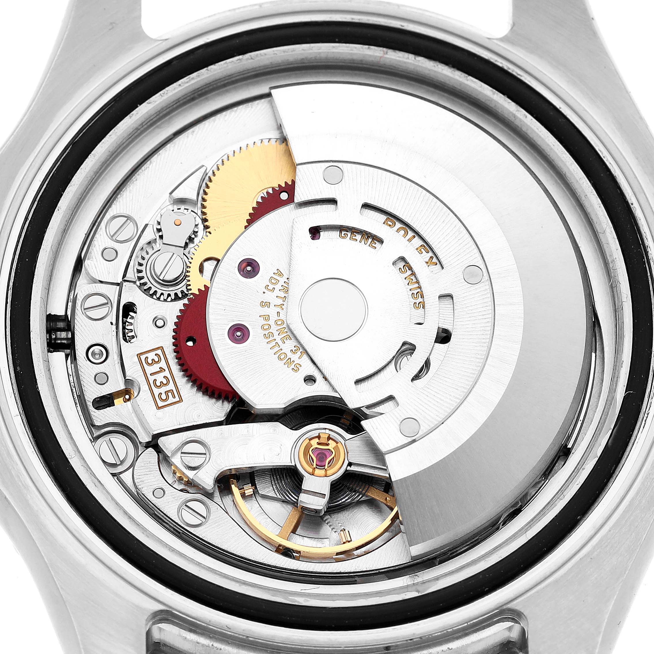 The image shows the movement of a Rolex Yacht-Master 116622 Men's Stainless Steel Blue Dial watch from a back view, detailing gears and the rotor.