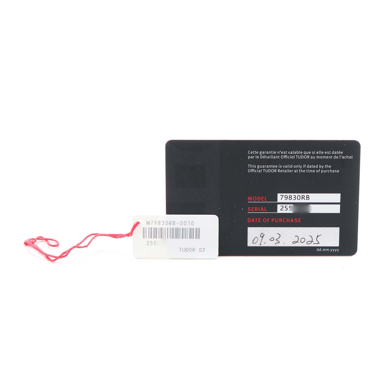 The image shows a Tudor Heritage Black Bay 79830RB Men's Stainless Steel Silver Dial warranty card and tag, displayed frontally.