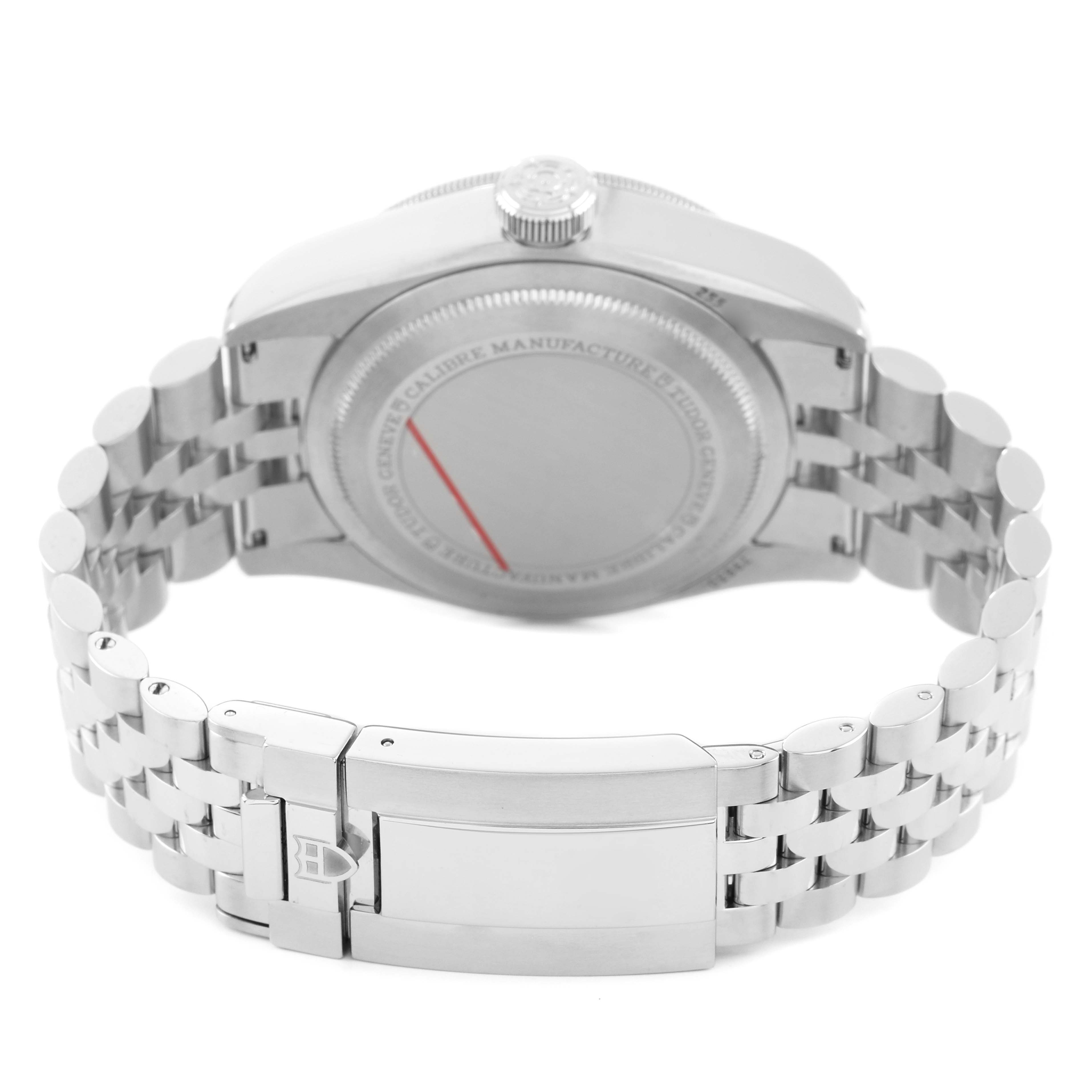 The image shows the back case and bracelet of a Tudor Heritage Black Bay 79830RB Men's Stainless Steel Silver Dial watch from a rear angle.